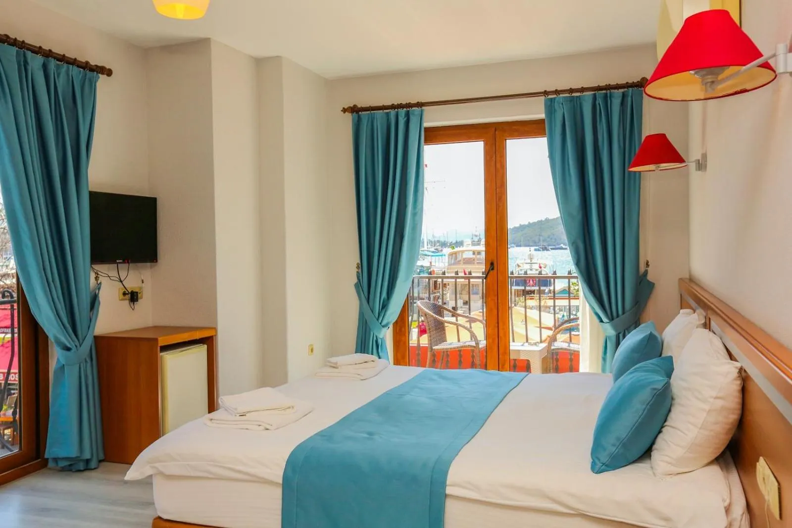 Photo of the whole room, Bed in Gocek Unlu Hotel