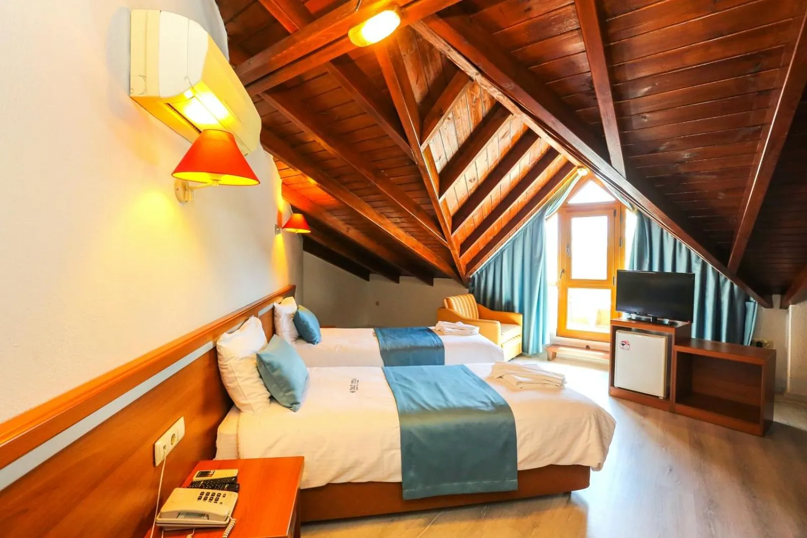 Photo of the whole room, Bed in Gocek Unlu Hotel