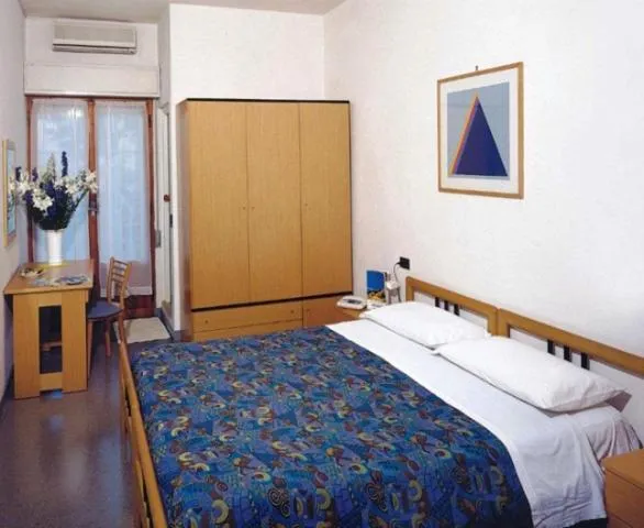 Bed in Hotel Capitol