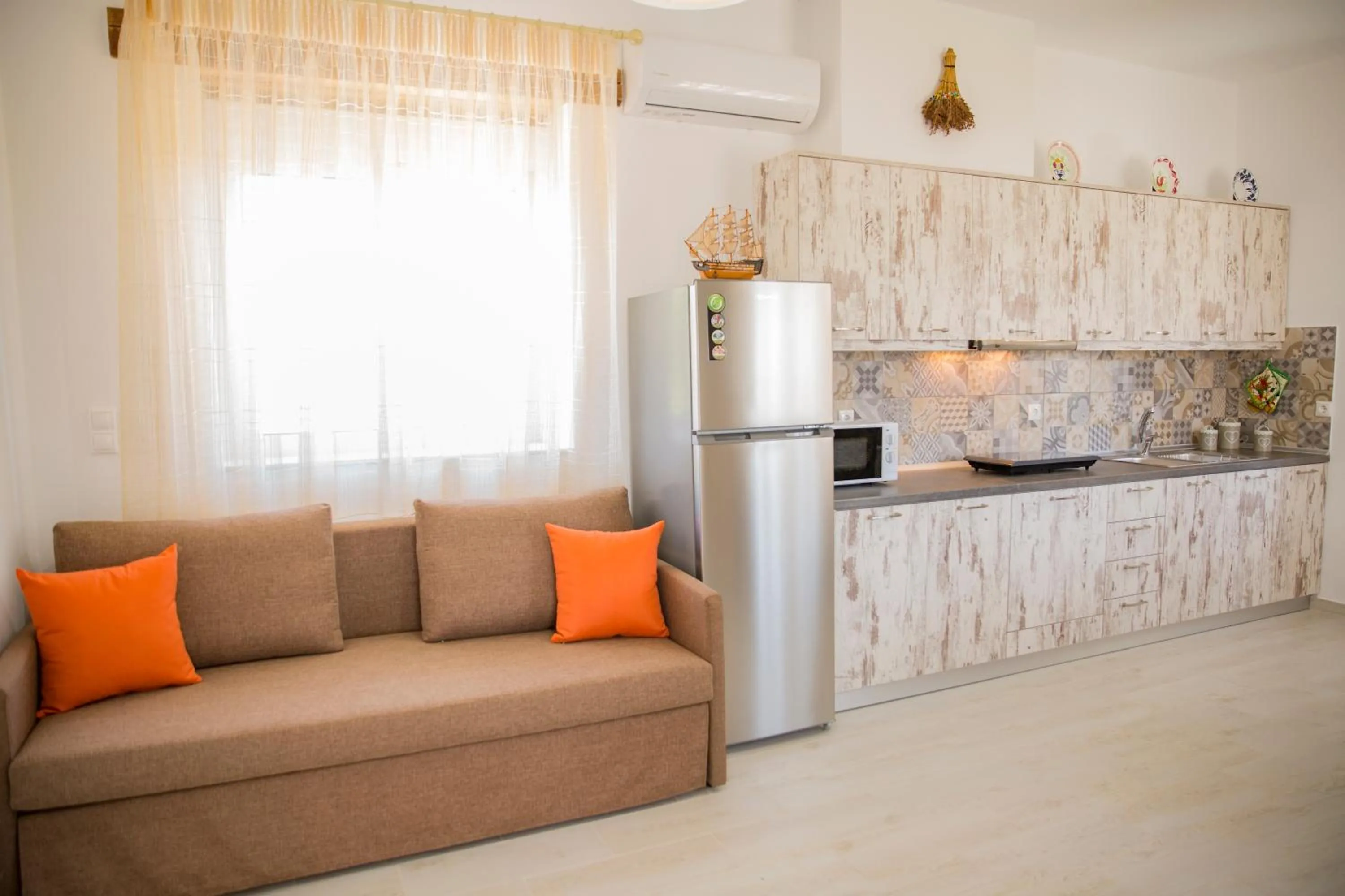 TV and multimedia in Haraki Stone Apartments