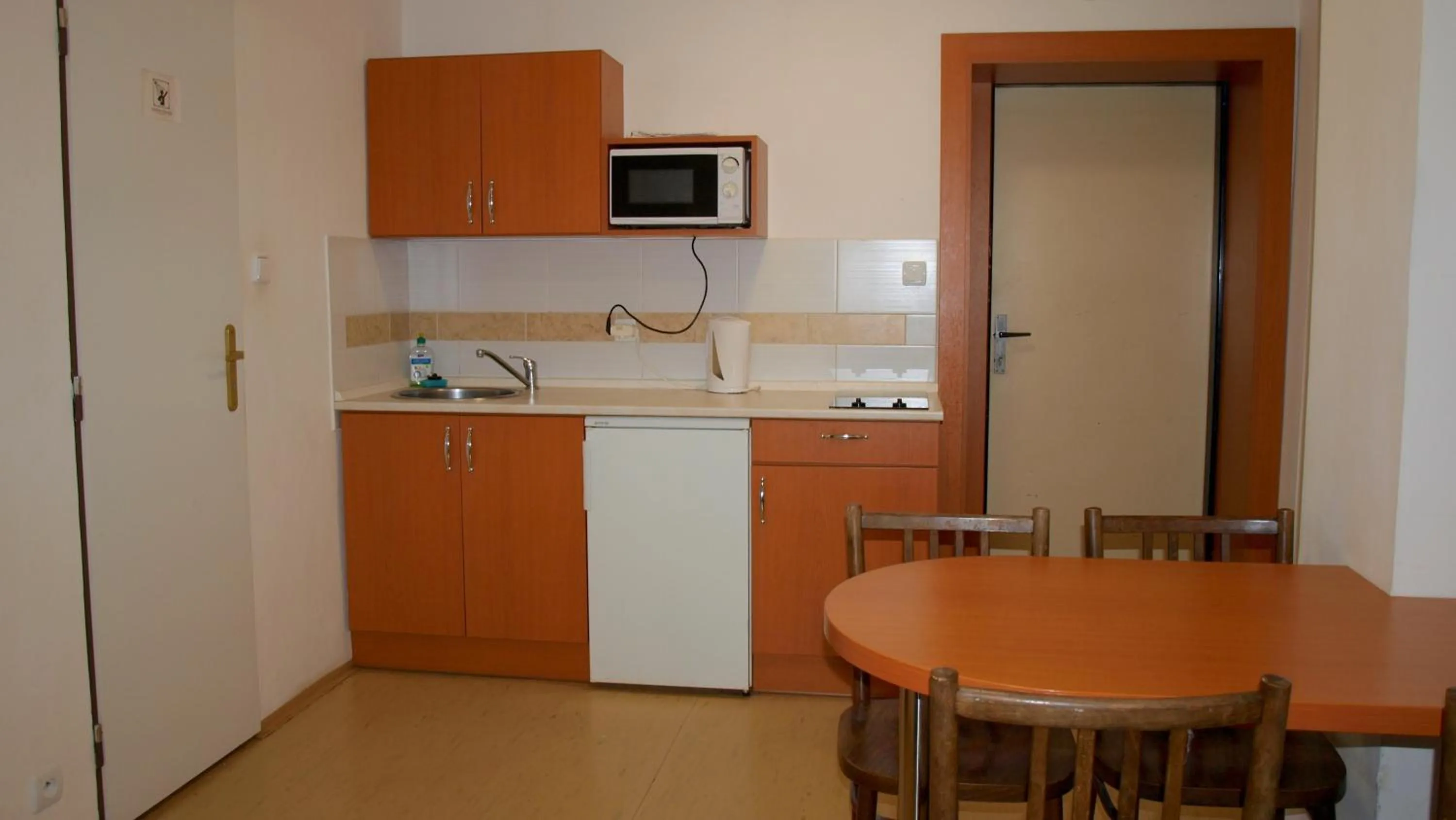 Kitchen or kitchenette in Pension Village