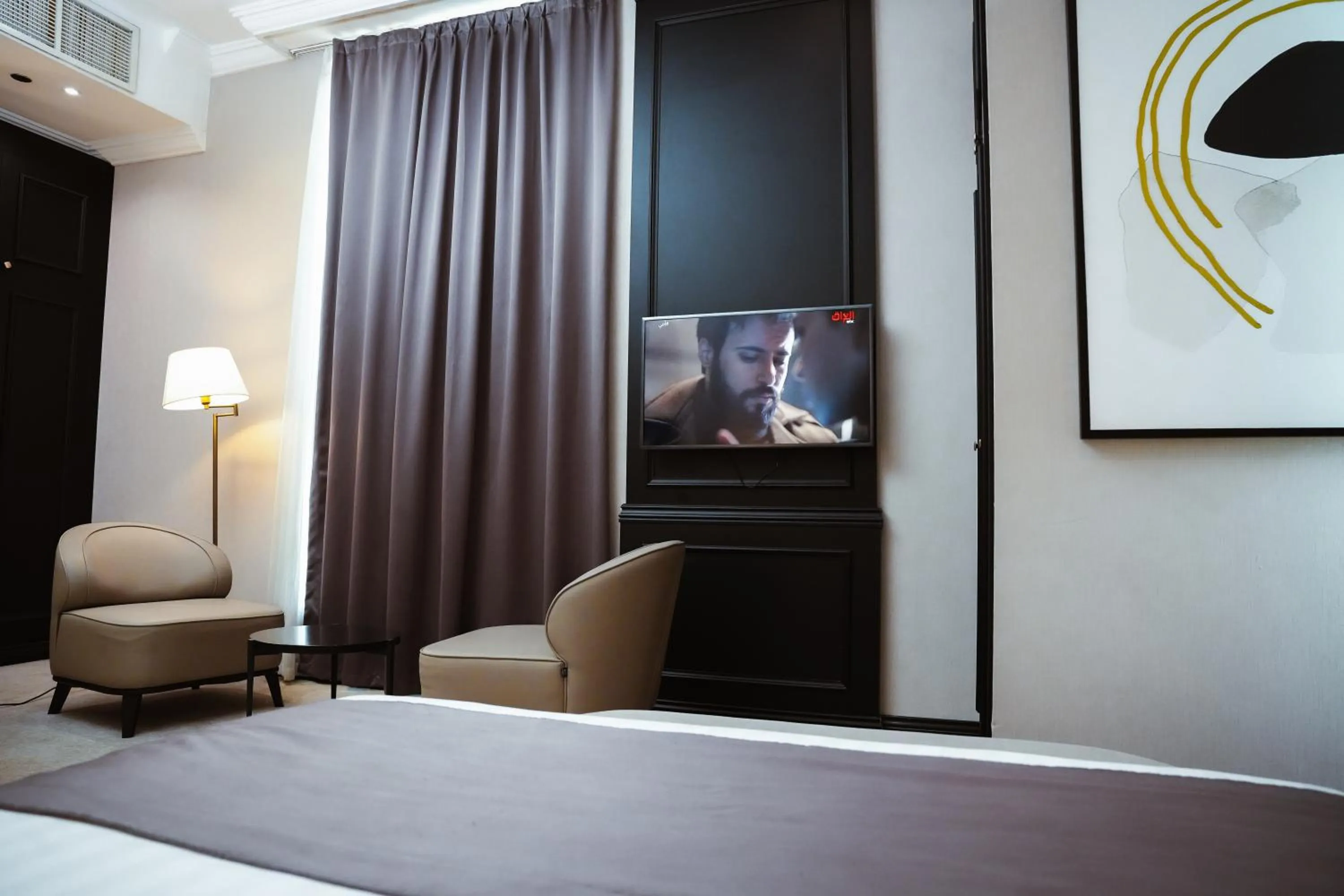 Bed in Horizon Manor Hotel