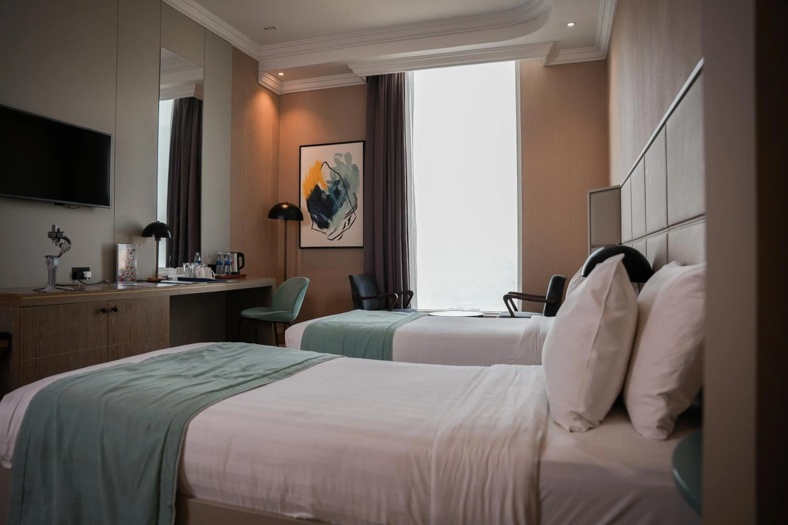 Bed in Horizon Manor Hotel