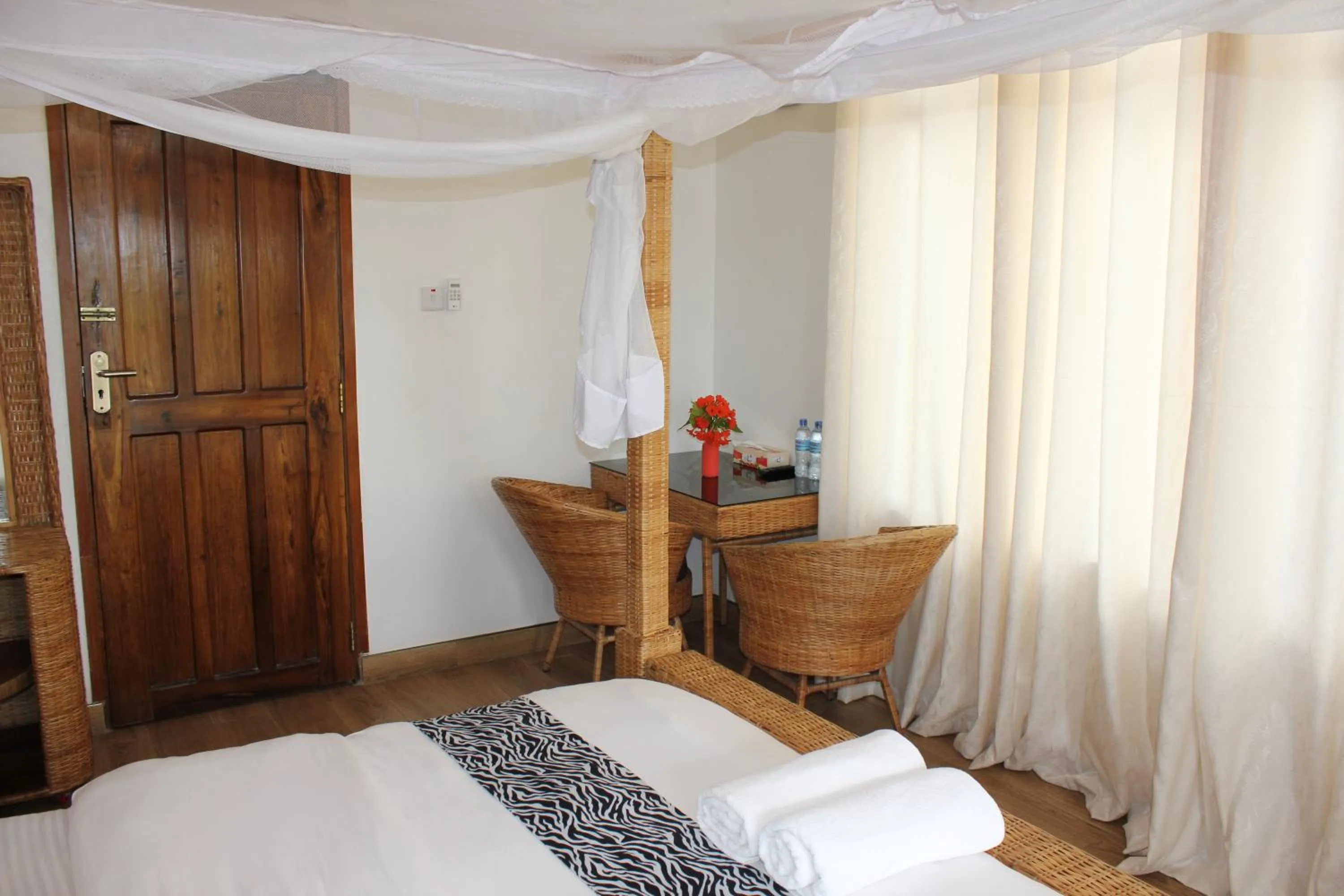 Bed in Villa Dahl Beach Resort