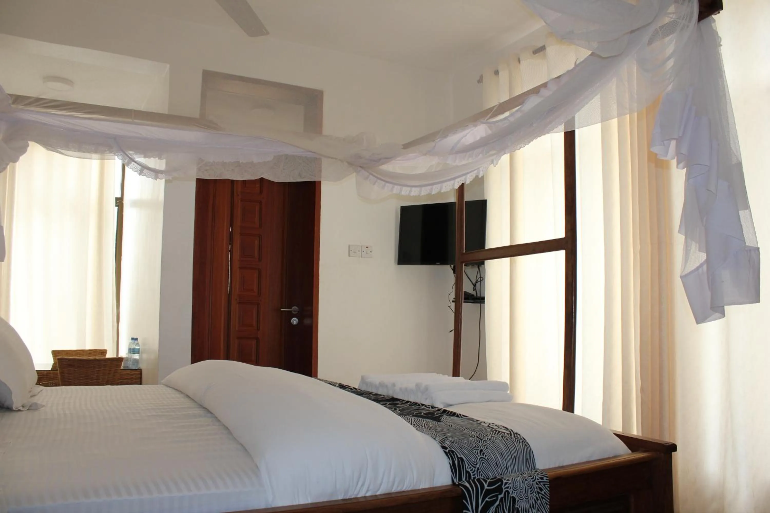 Bed in Villa Dahl Beach Resort