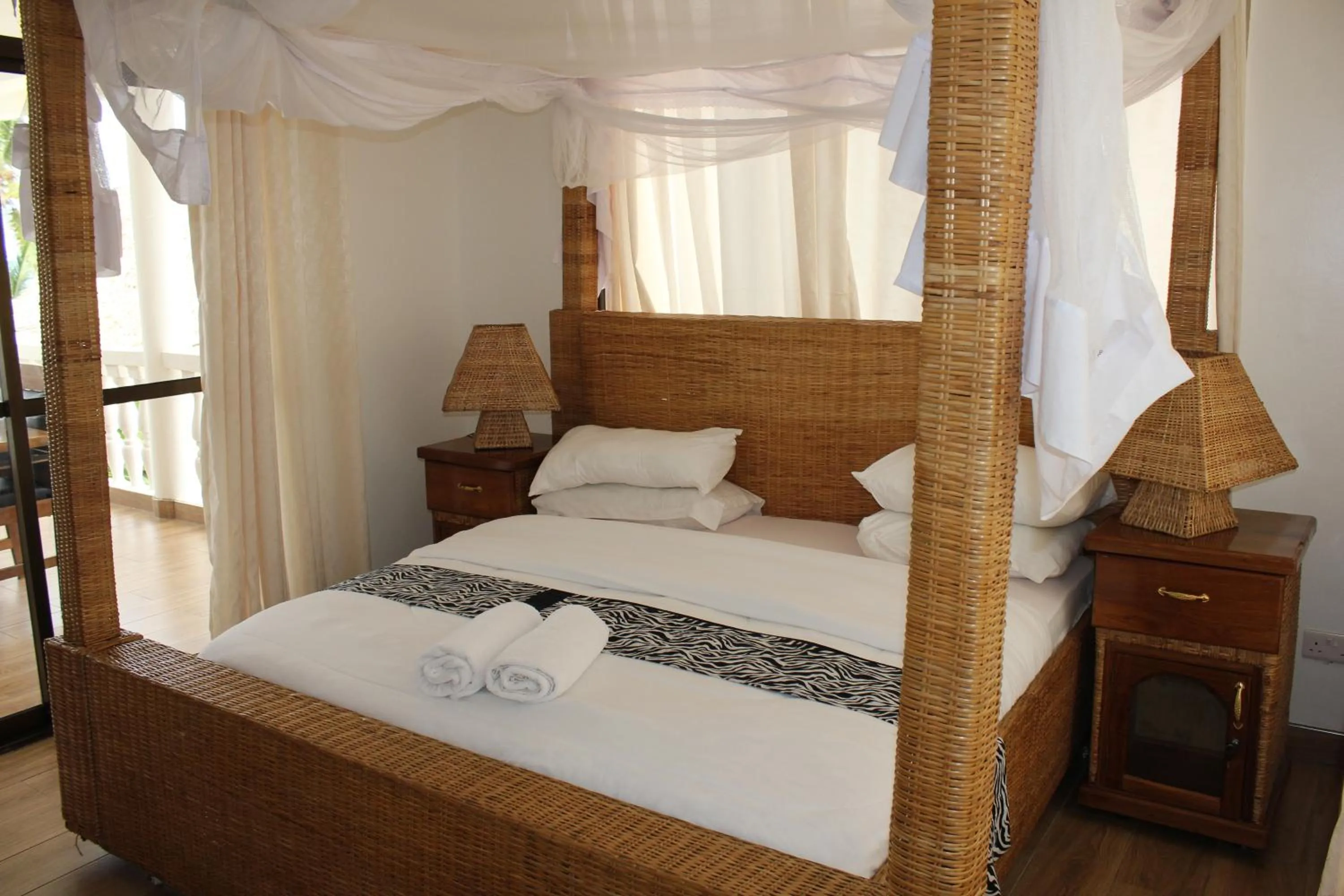 Bed in Villa Dahl Beach Resort