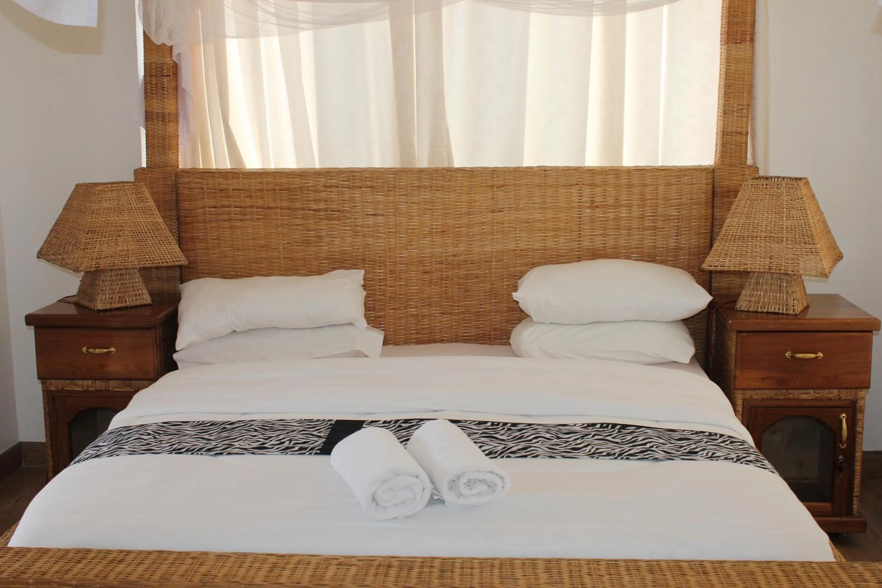 Bed in Villa Dahl Beach Resort
