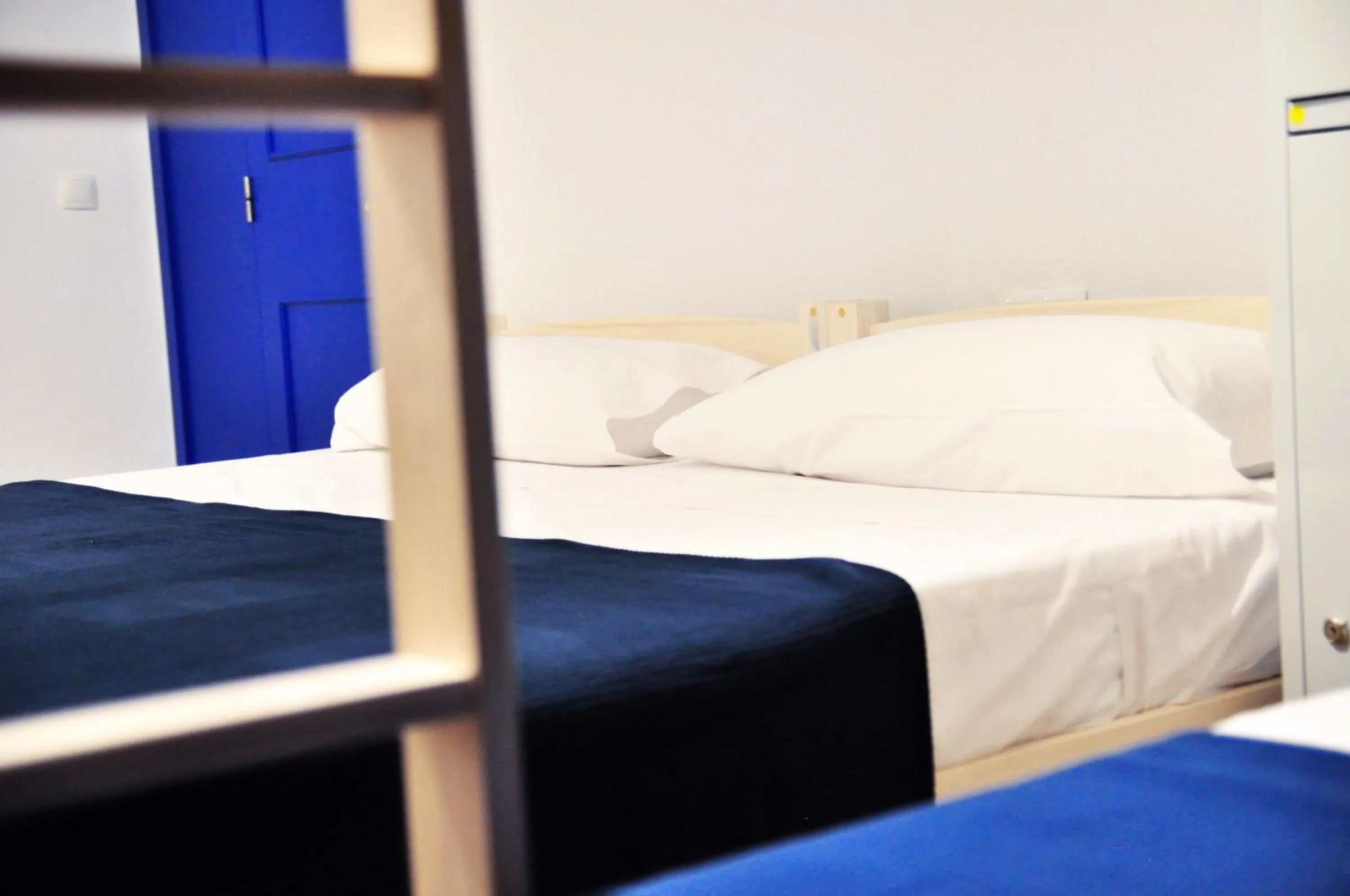 Bed in Hostal Porto Mar