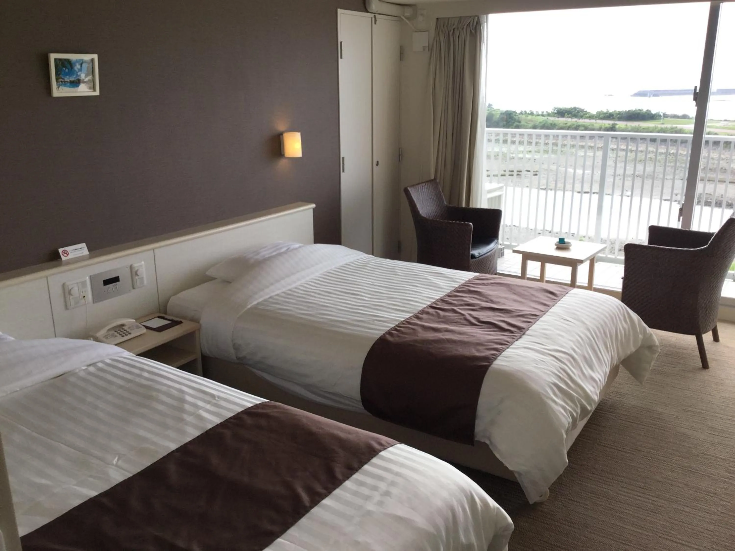 Photo of the whole room, Bed in Hotel Gran View Garden Okinawa