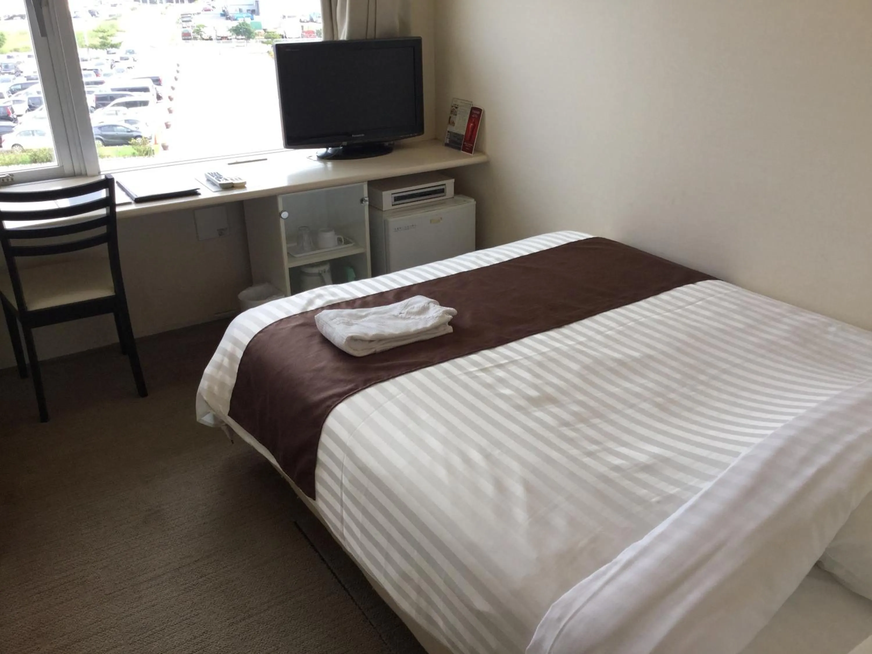 Photo of the whole room, Bed in Hotel Gran View Garden Okinawa