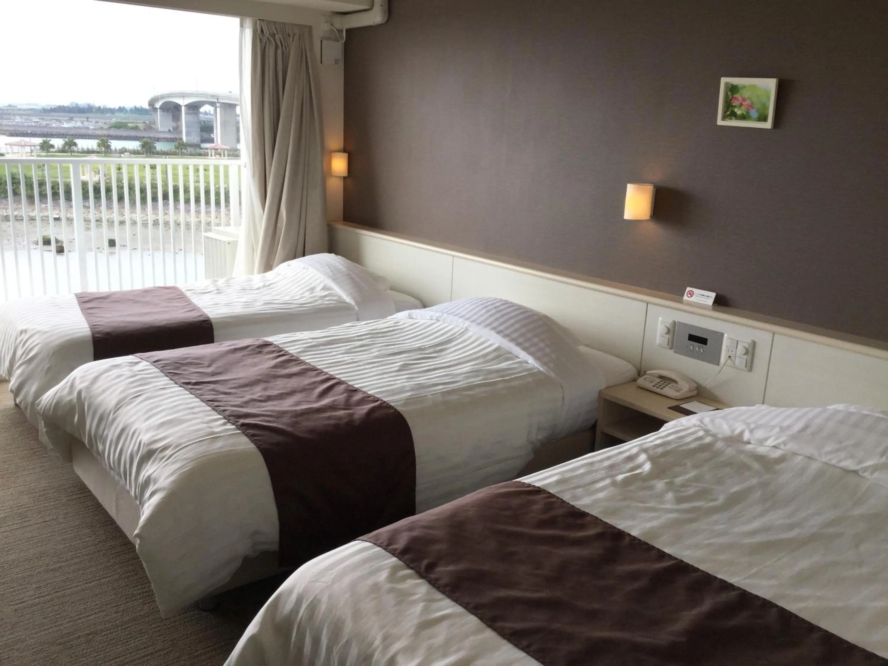 Photo of the whole room, Bed in Hotel Gran View Garden Okinawa