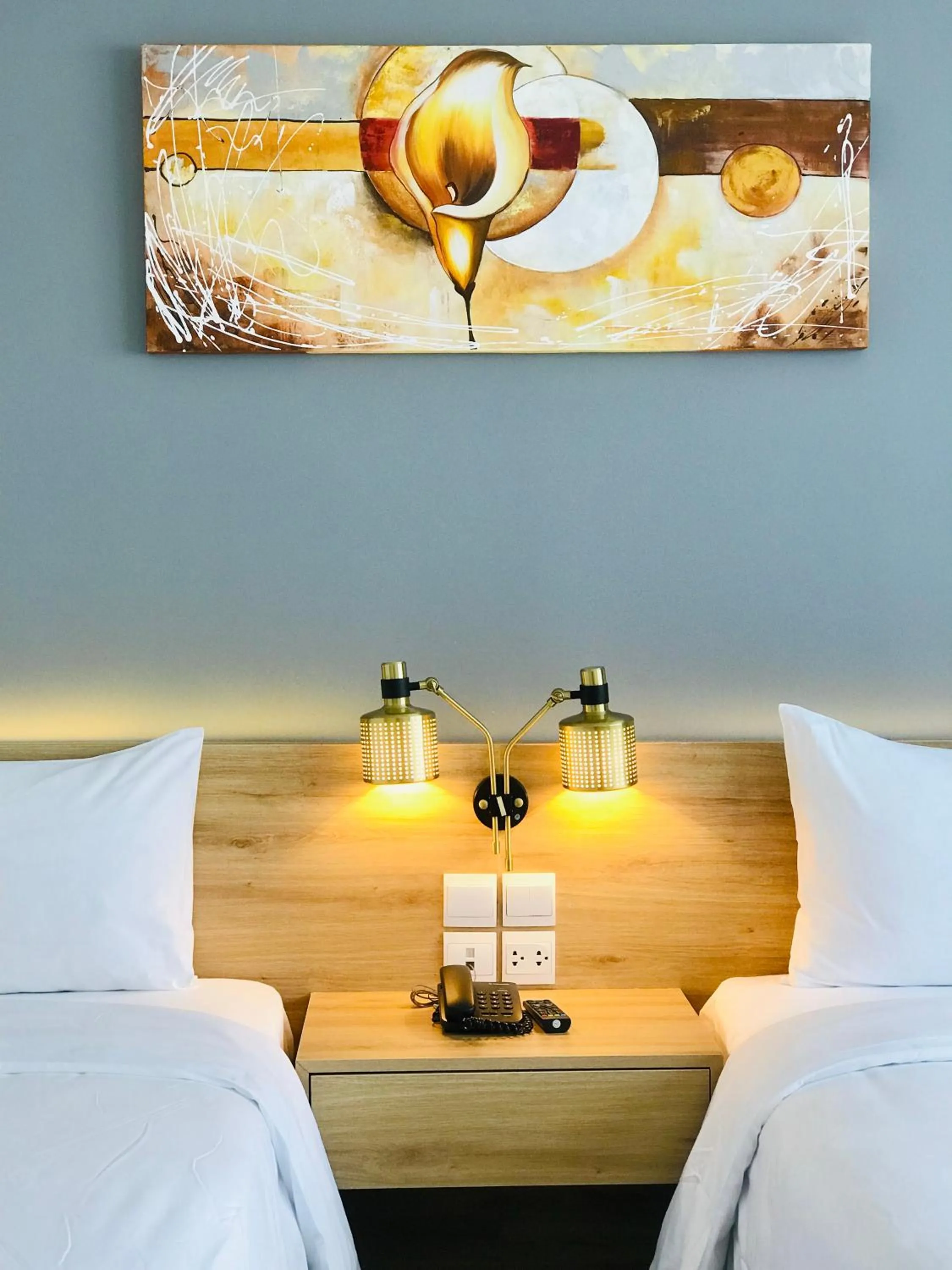 Bed in Magnolia Hotel