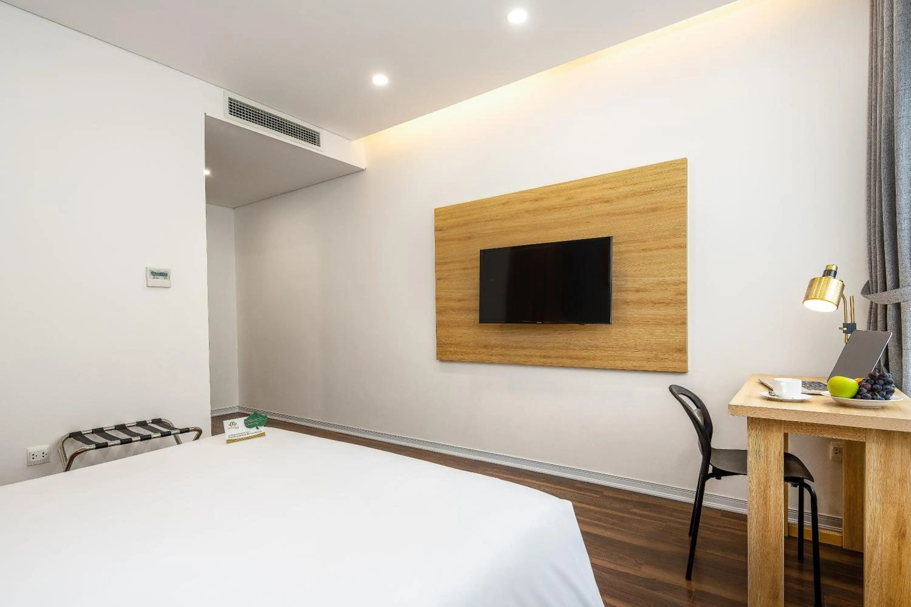 Bed in Magnolia Hotel