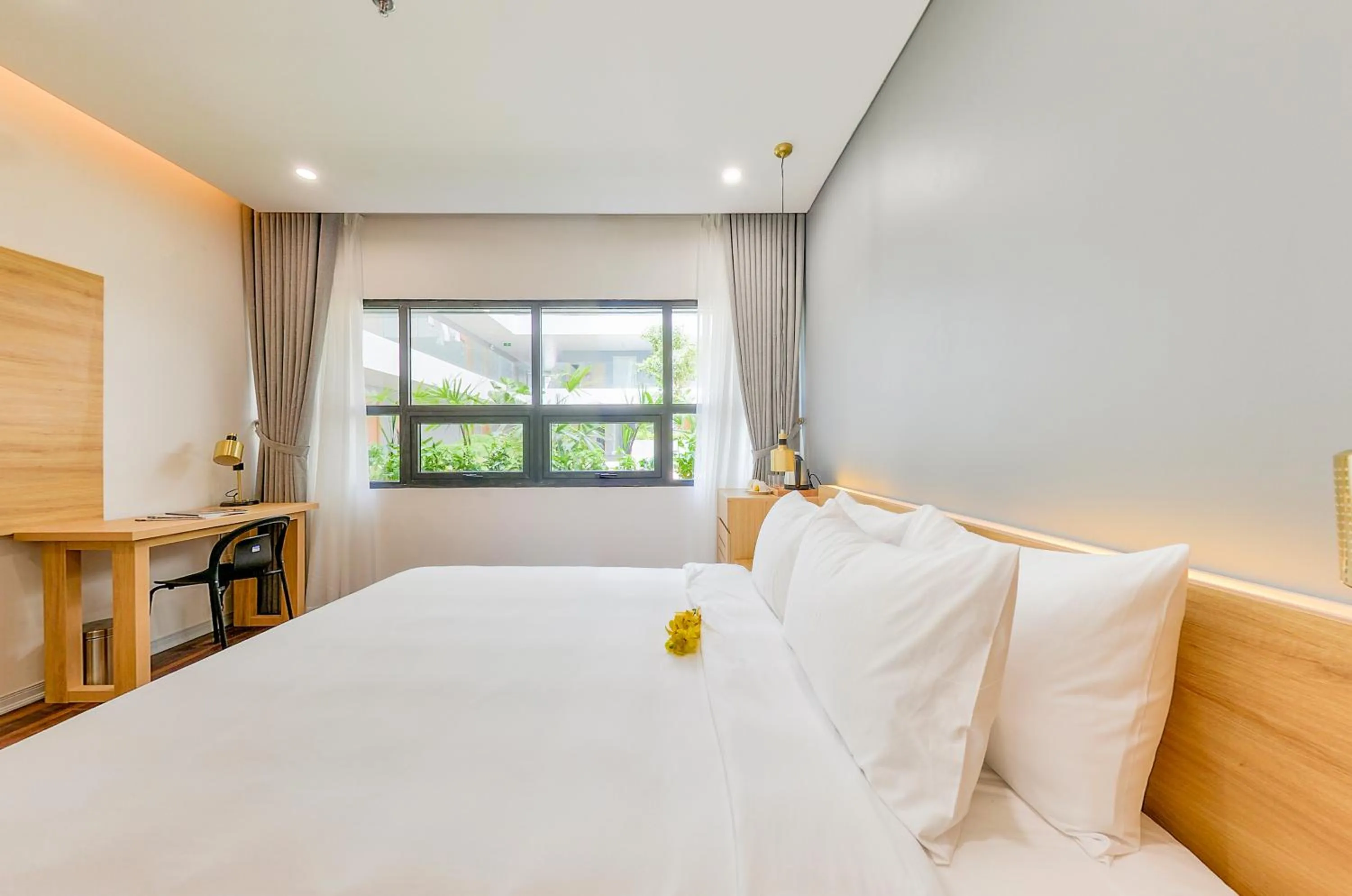 Bed in Magnolia Hotel