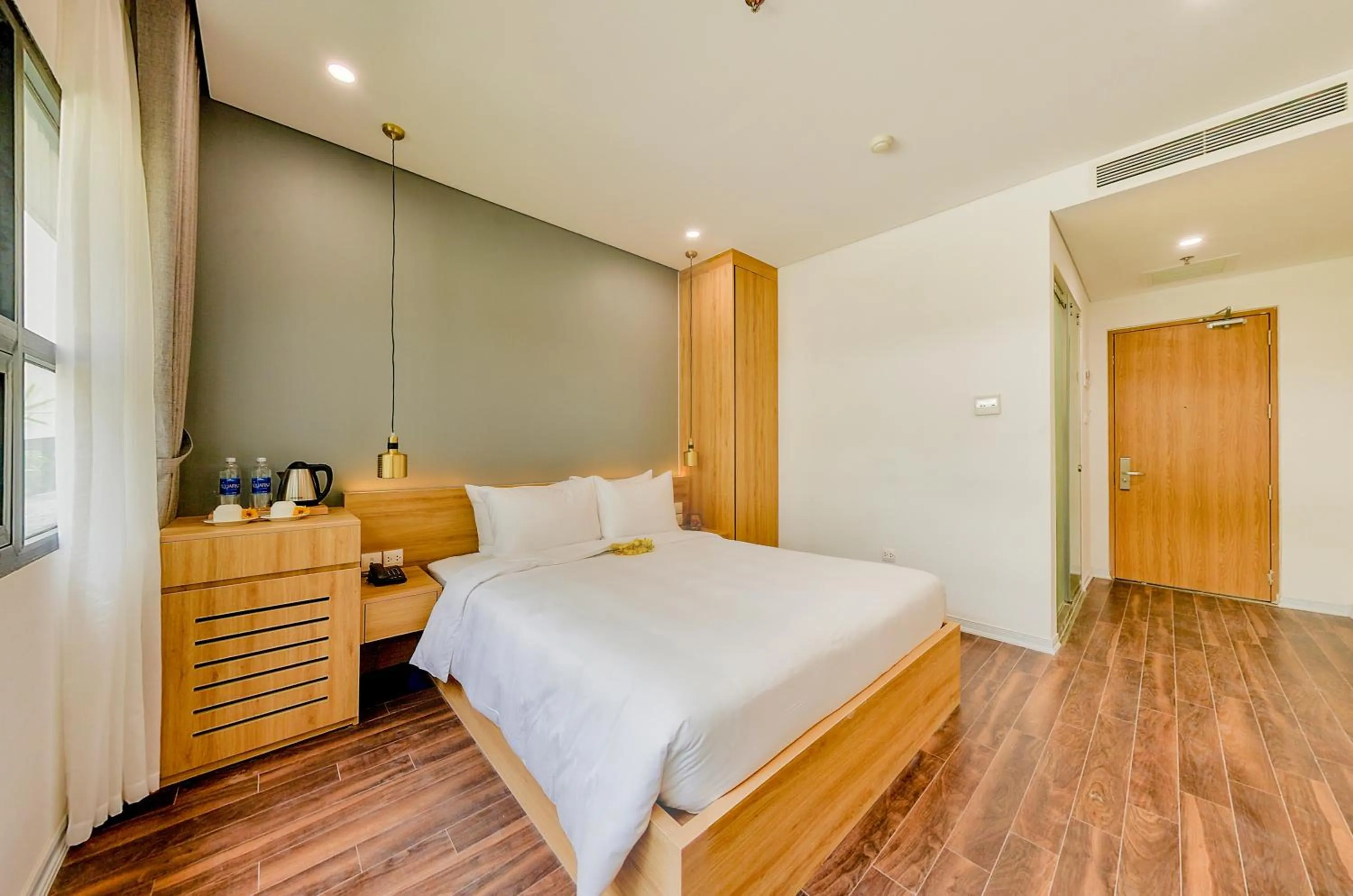 Bed in Magnolia Hotel