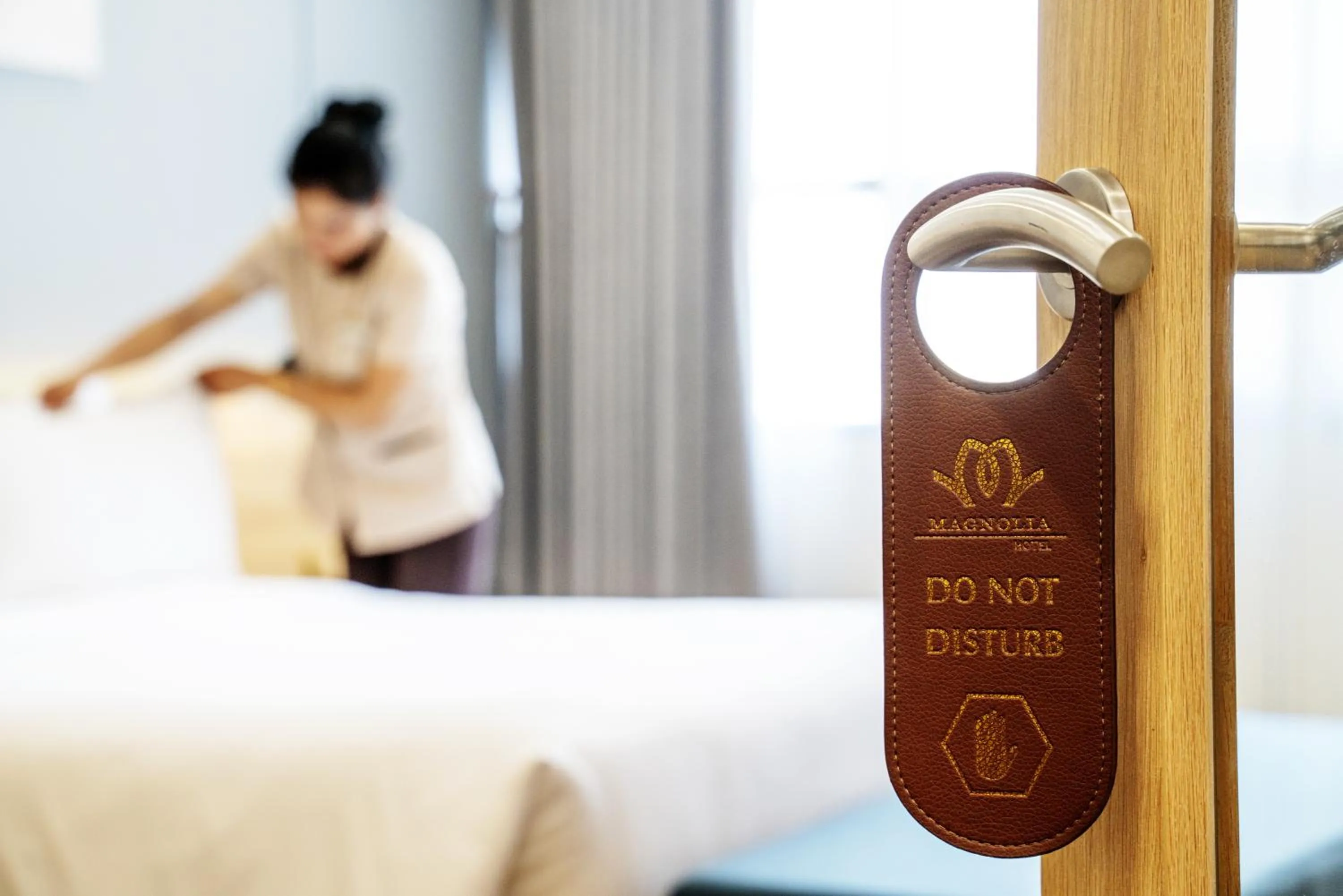 Bed in Magnolia Hotel