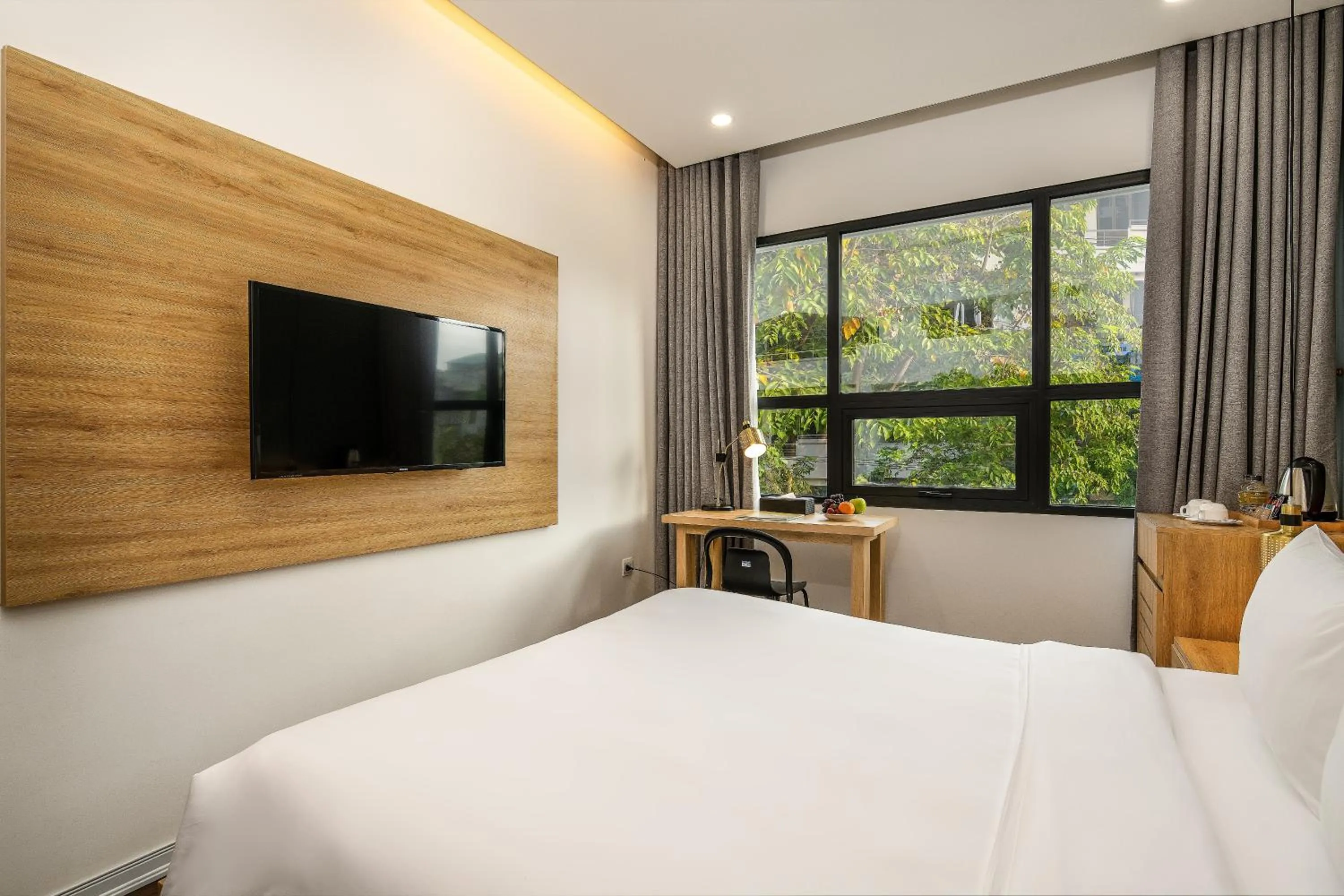 Bed in Magnolia Hotel