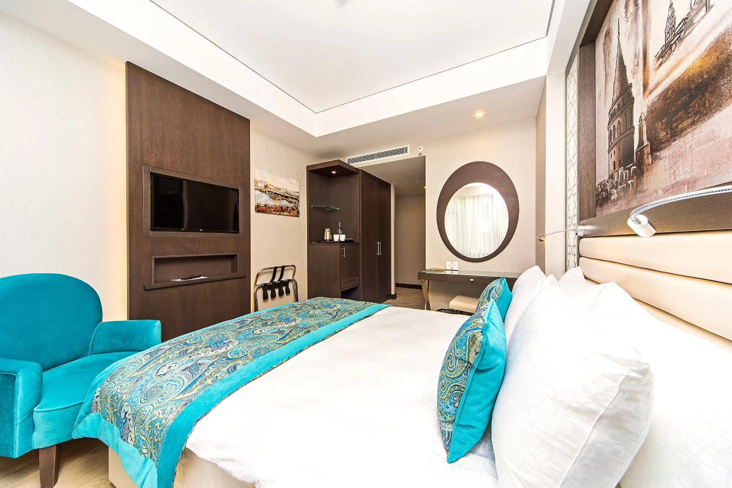 Bed in Mukarnas Taksim Hotel