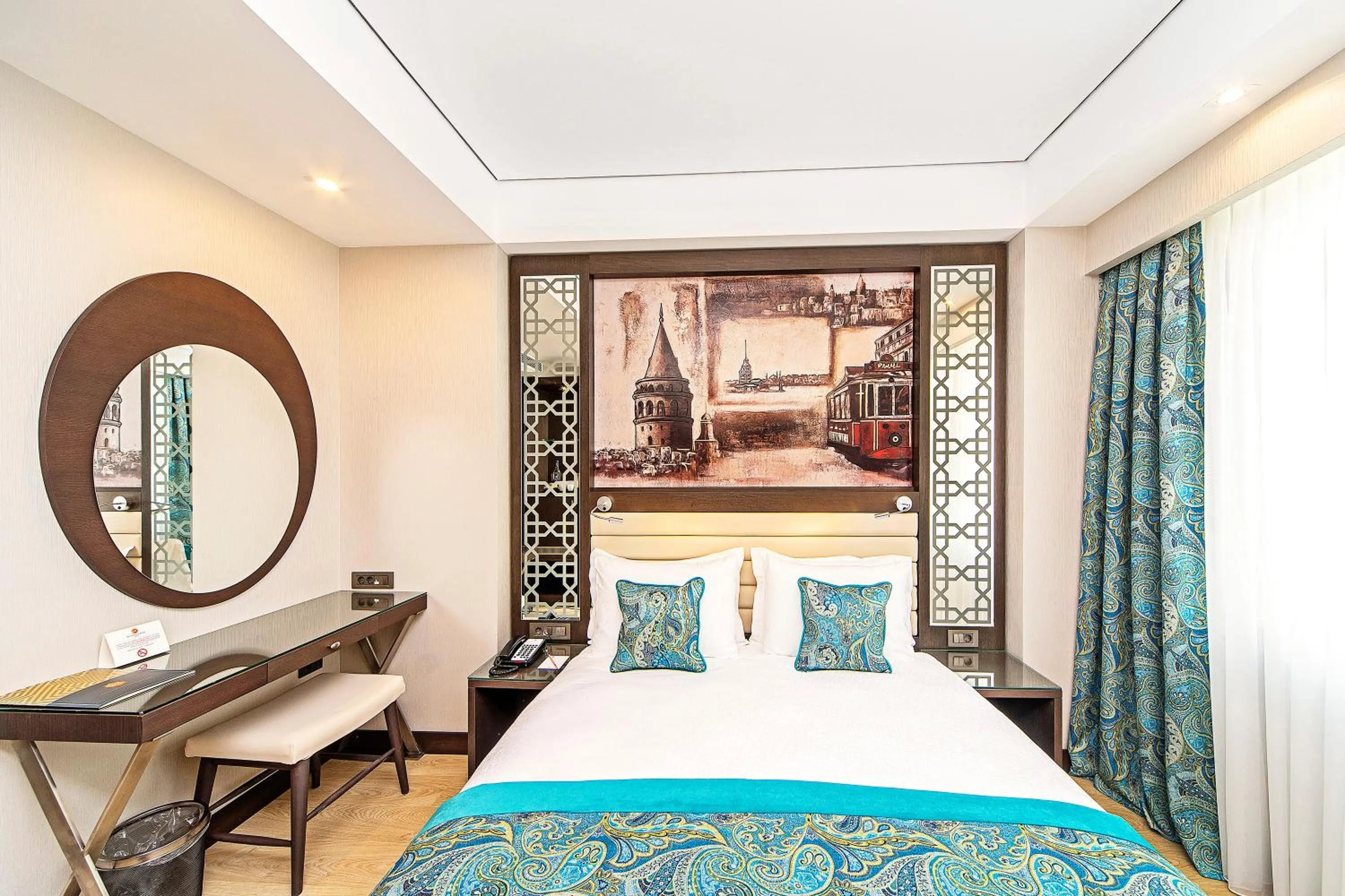 Bed in Mukarnas Taksim Hotel