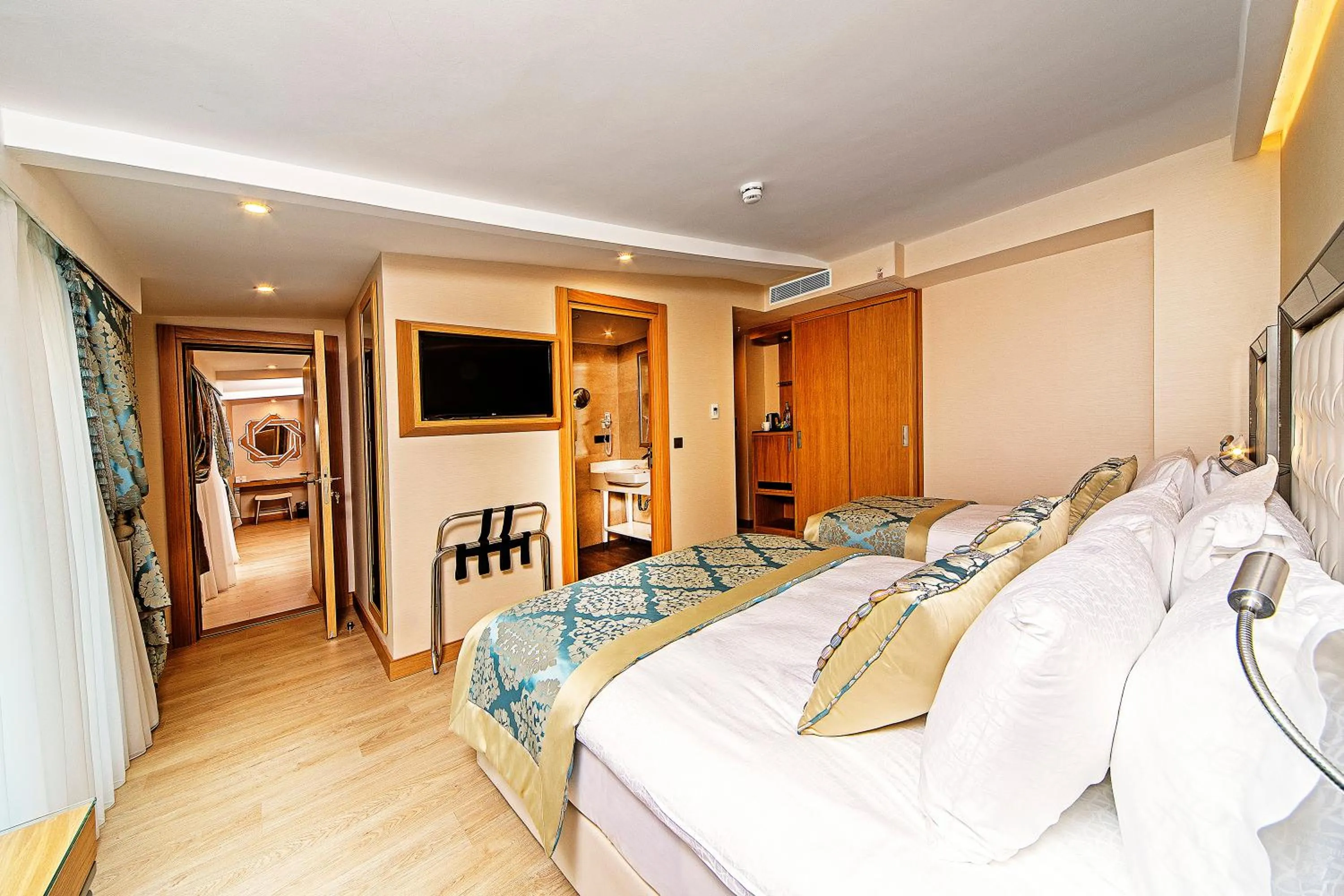 Bed in Mukarnas Taksim Hotel