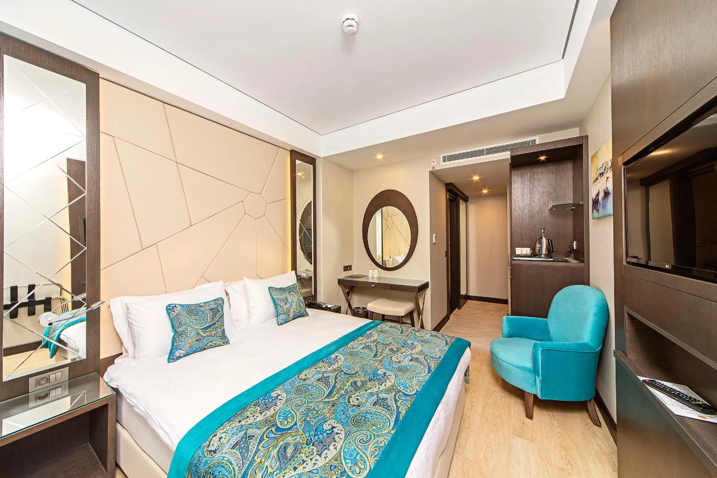 Bed in Mukarnas Taksim Hotel