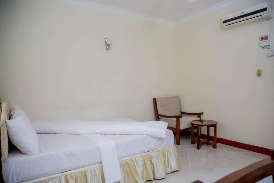 Bed in Kilimanjaro Crane Hotels & Safaris