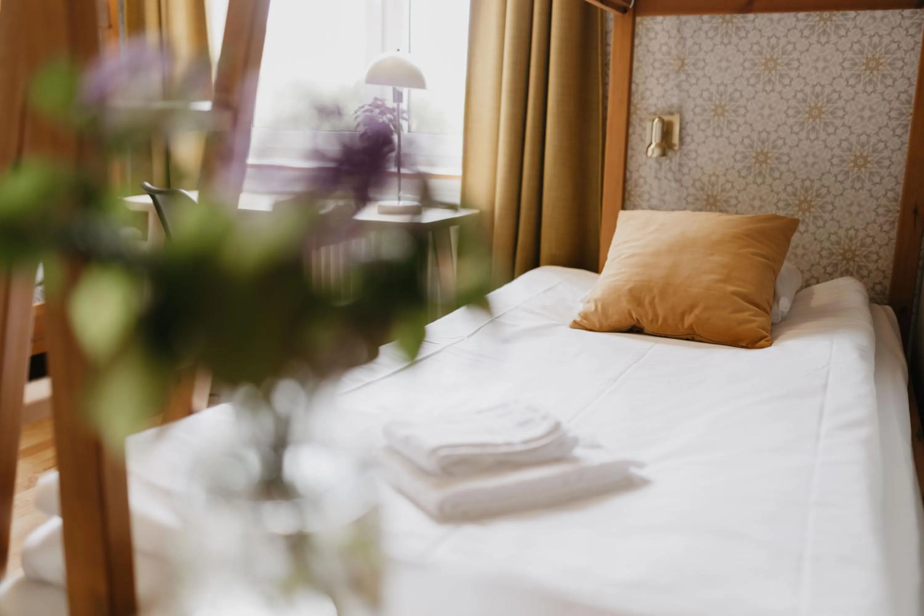 Photo of the whole room, Bed in Vassbo Vandrarhem