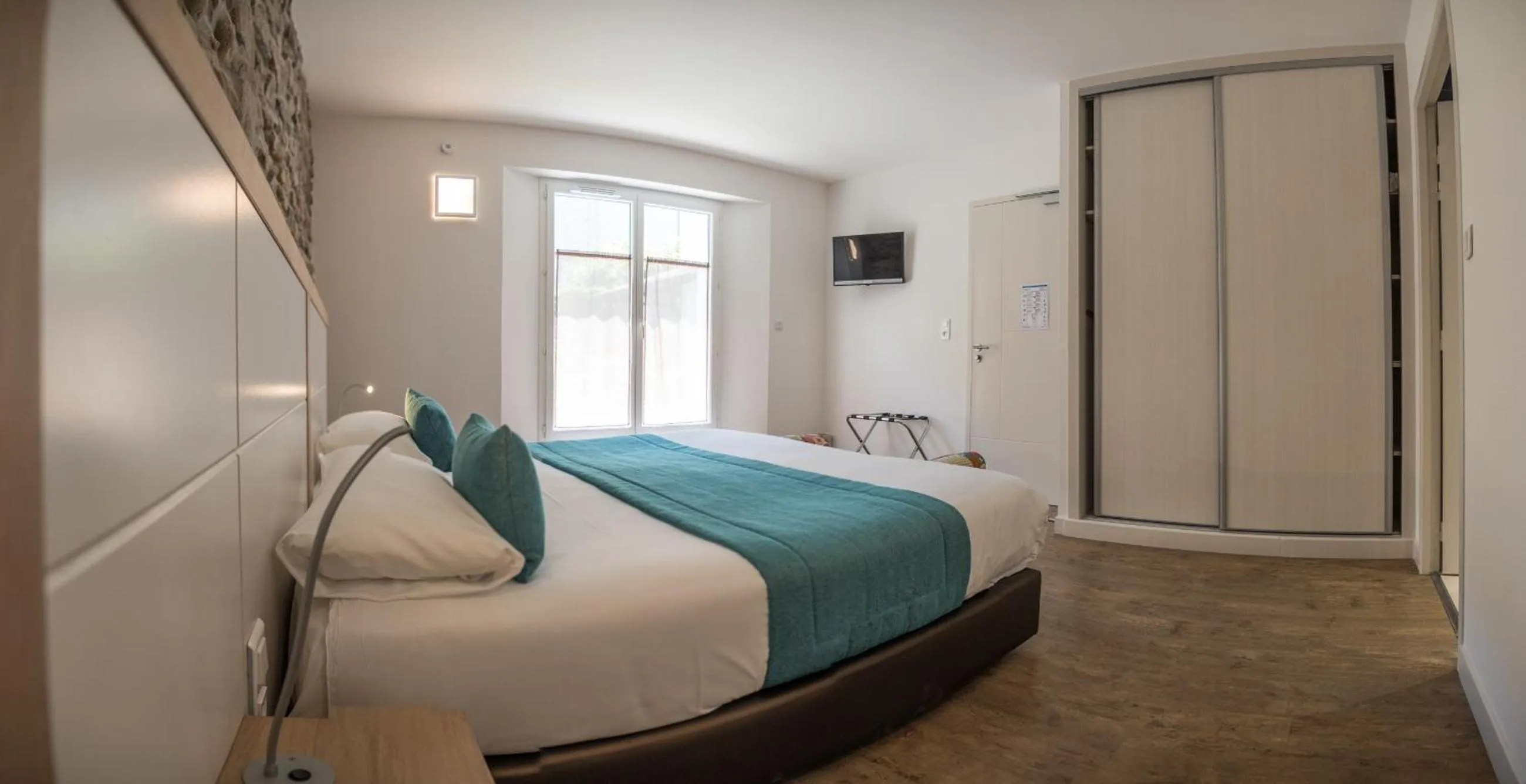 Photo of the whole room, Bed in Hôtel de la Rhune