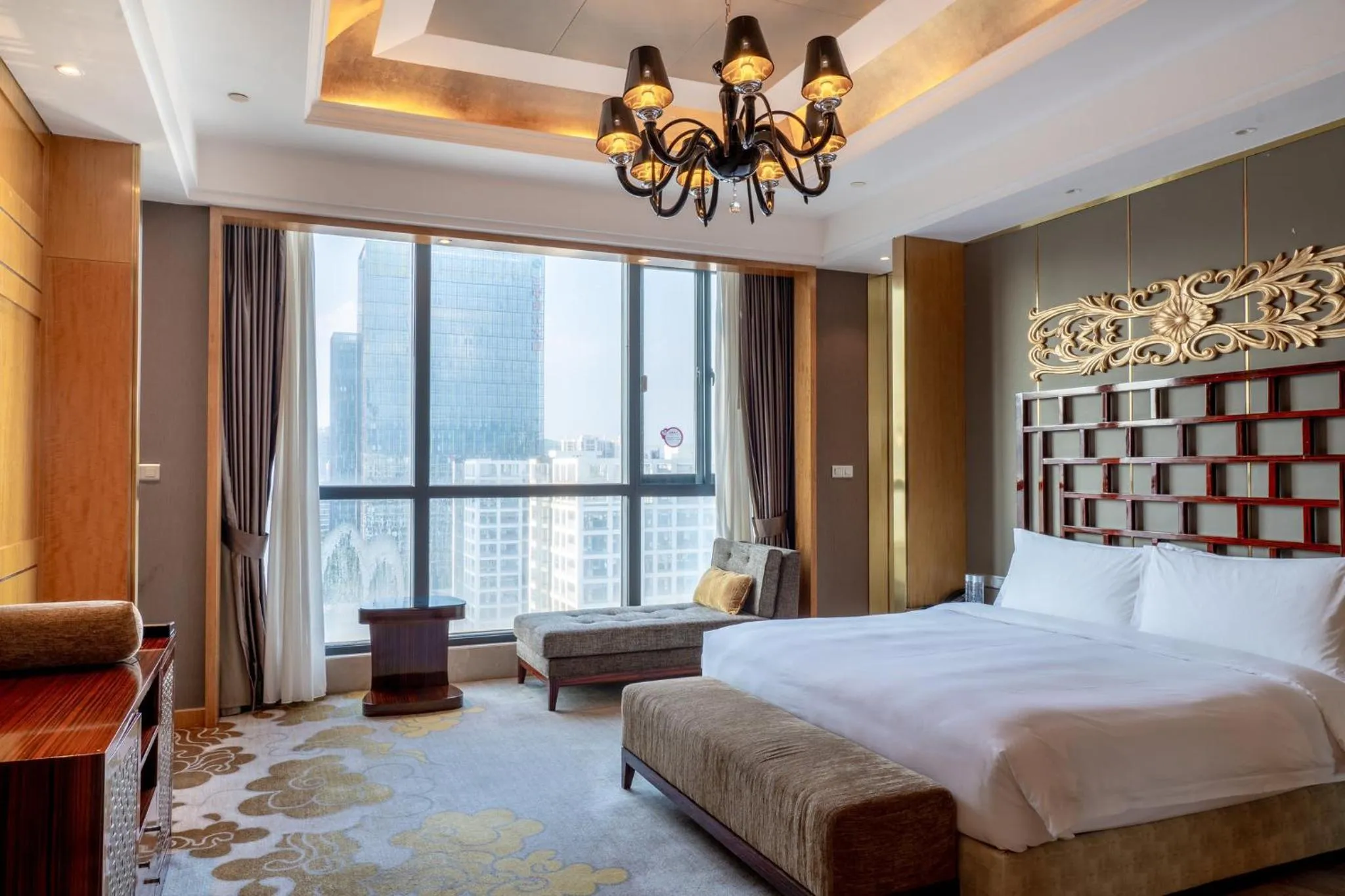 Photo of the whole room, Bed in Crowne Plaza Shenzhen Longgang City Centre by IHG
