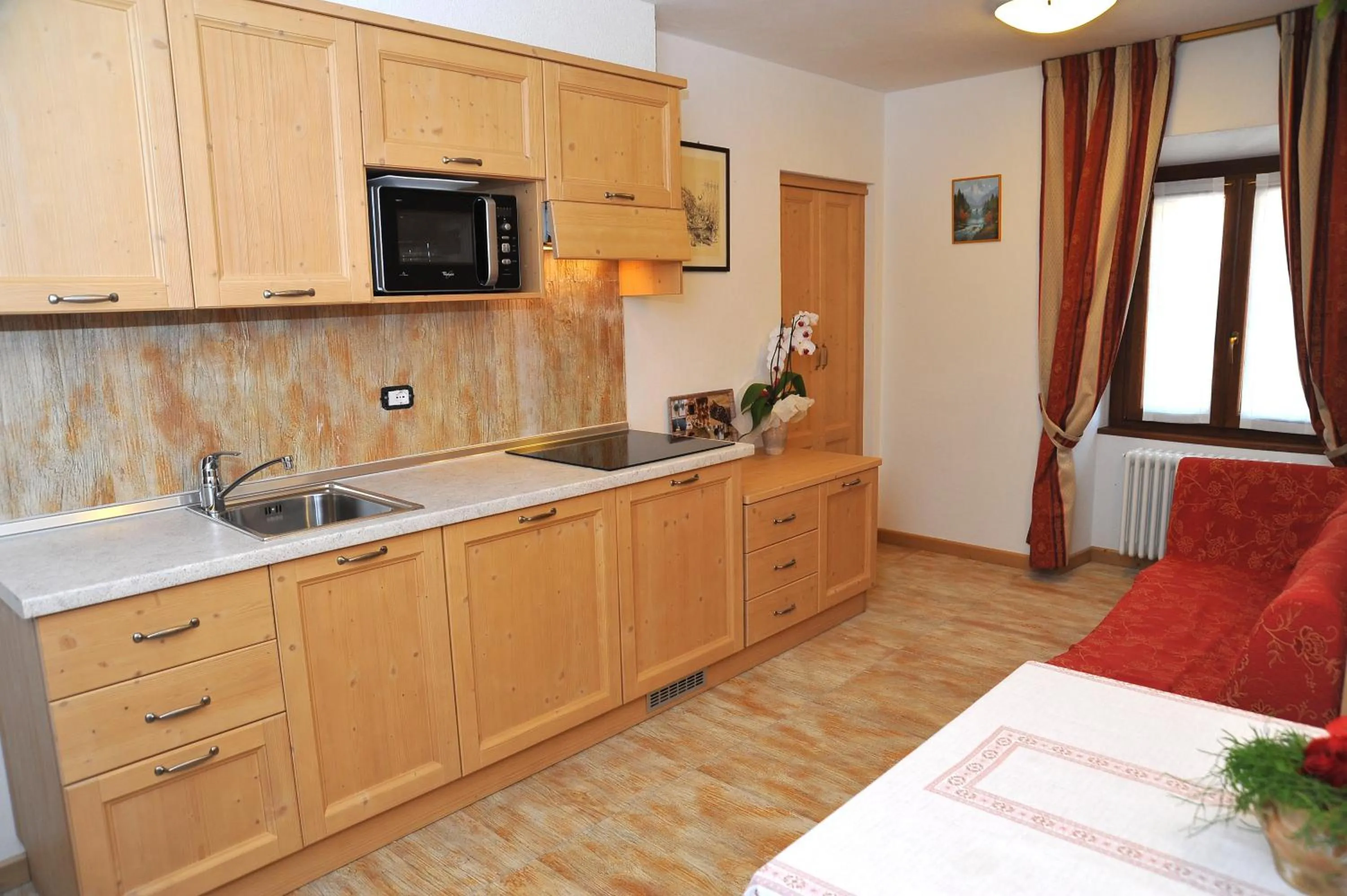 Kitchen or kitchenette in Albergo Stelvio