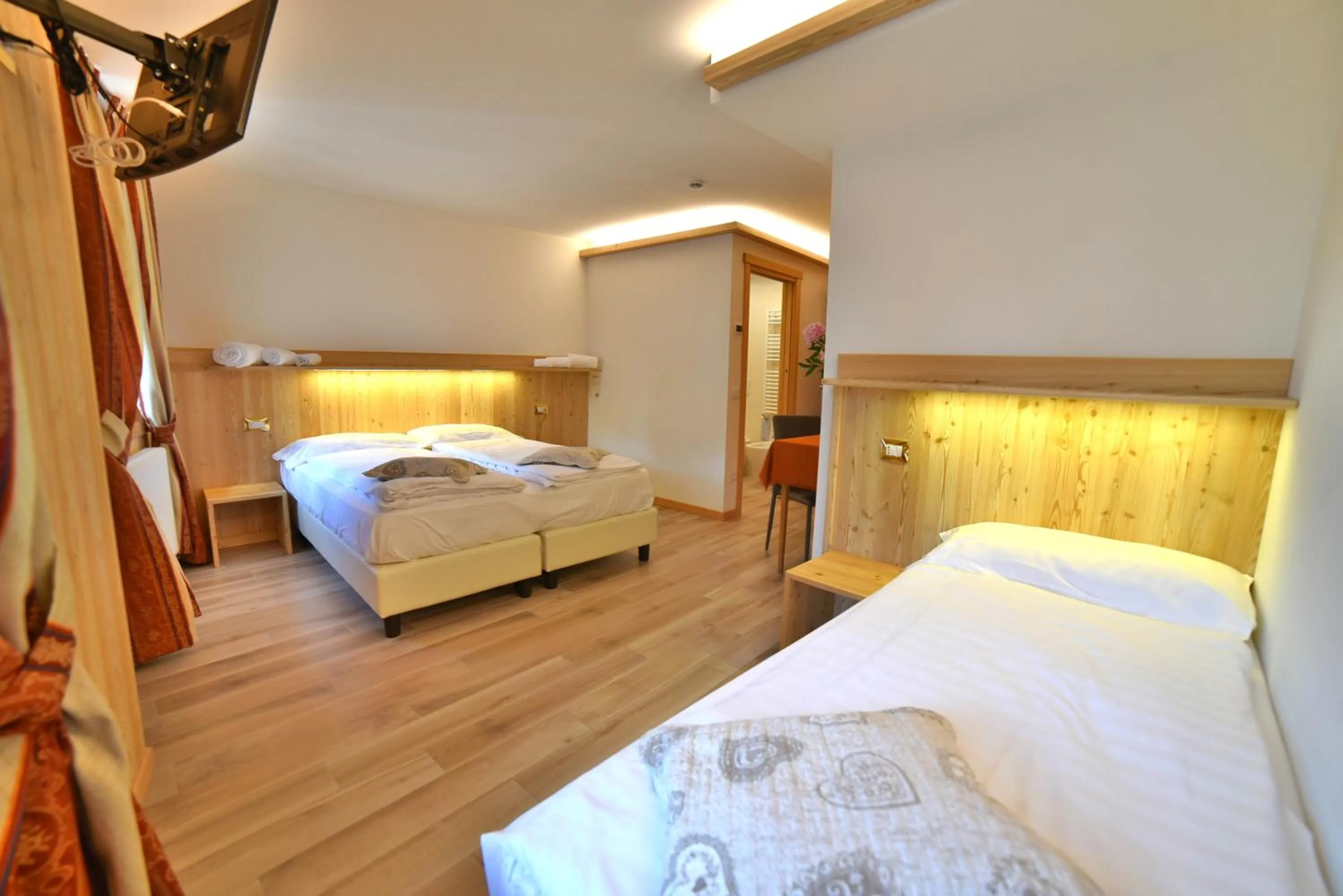 Bed in Albergo Stelvio