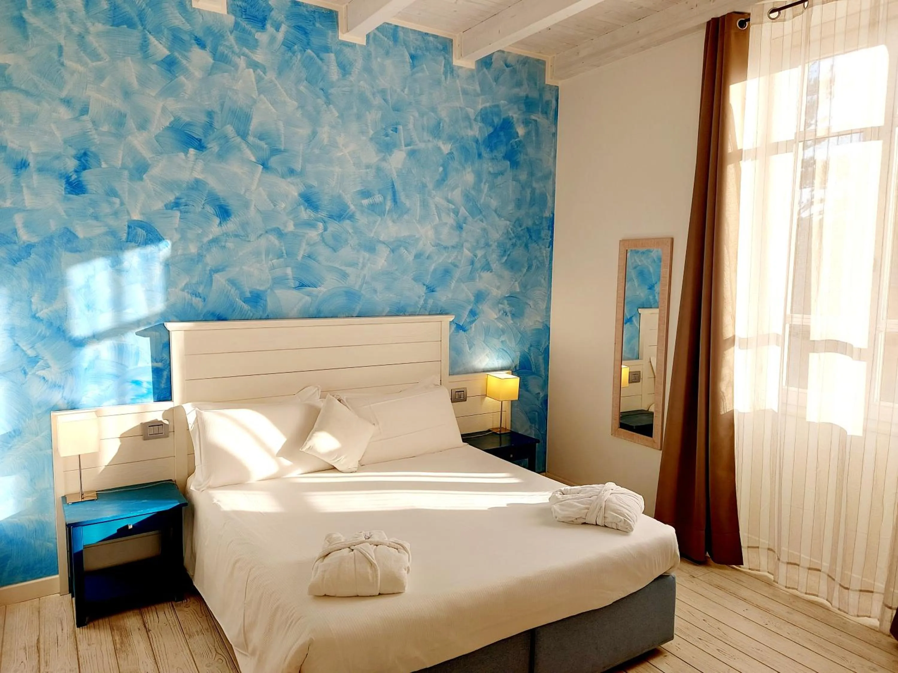 Bed in Hotel La Villa Del Mare