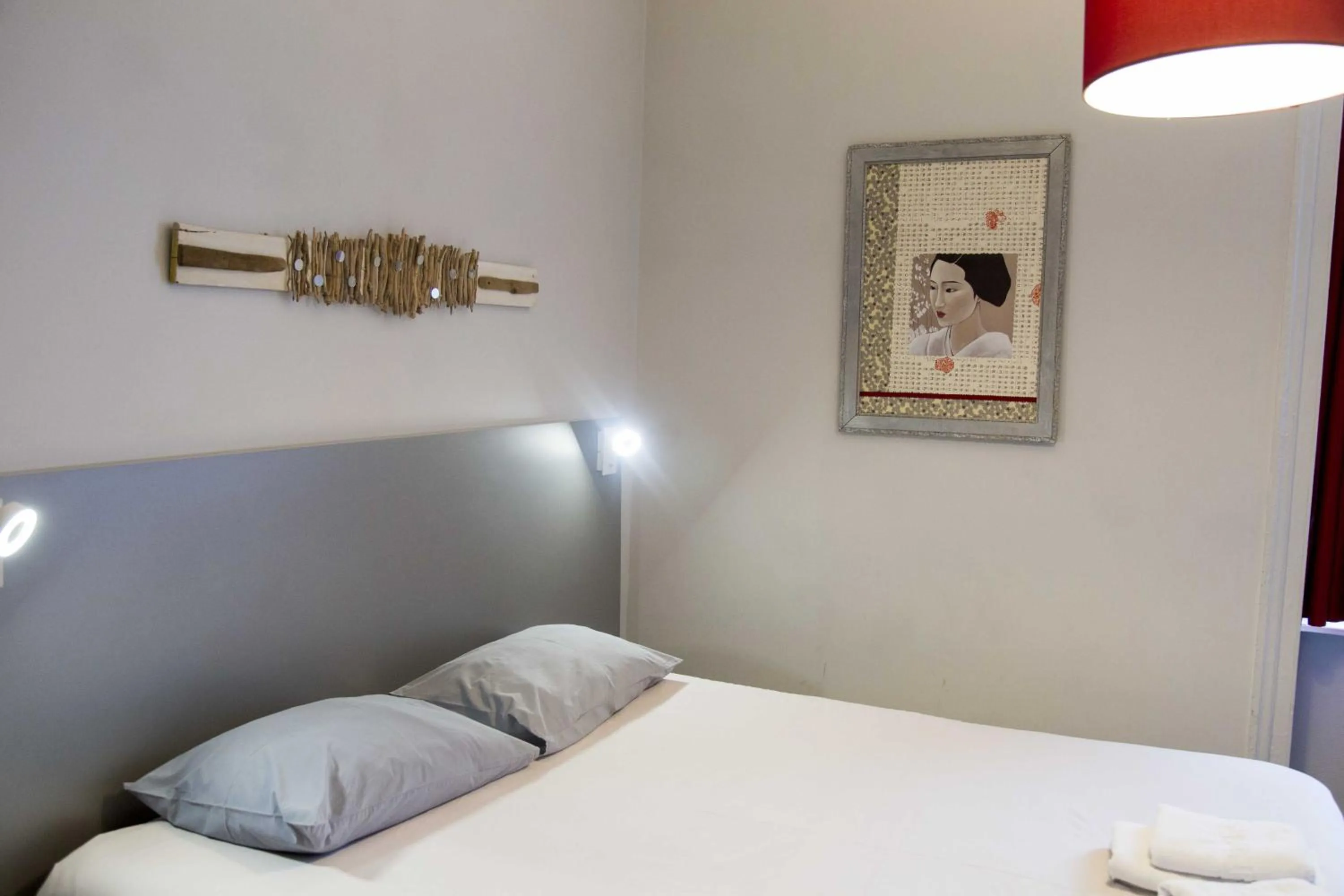 Bed in Smartappart Cherbourg (la rose des vents)