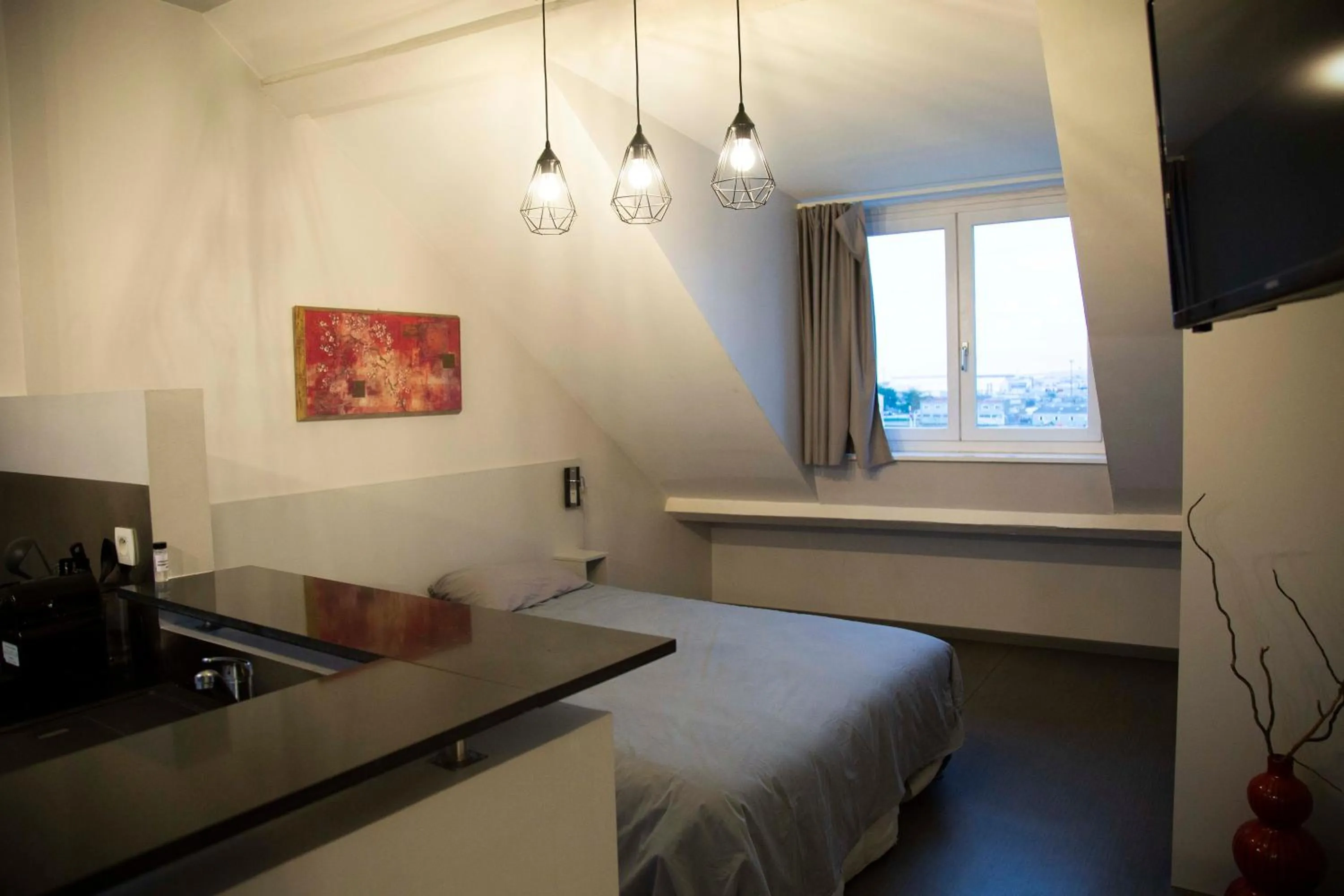 Bed in Smartappart Cherbourg (la rose des vents)