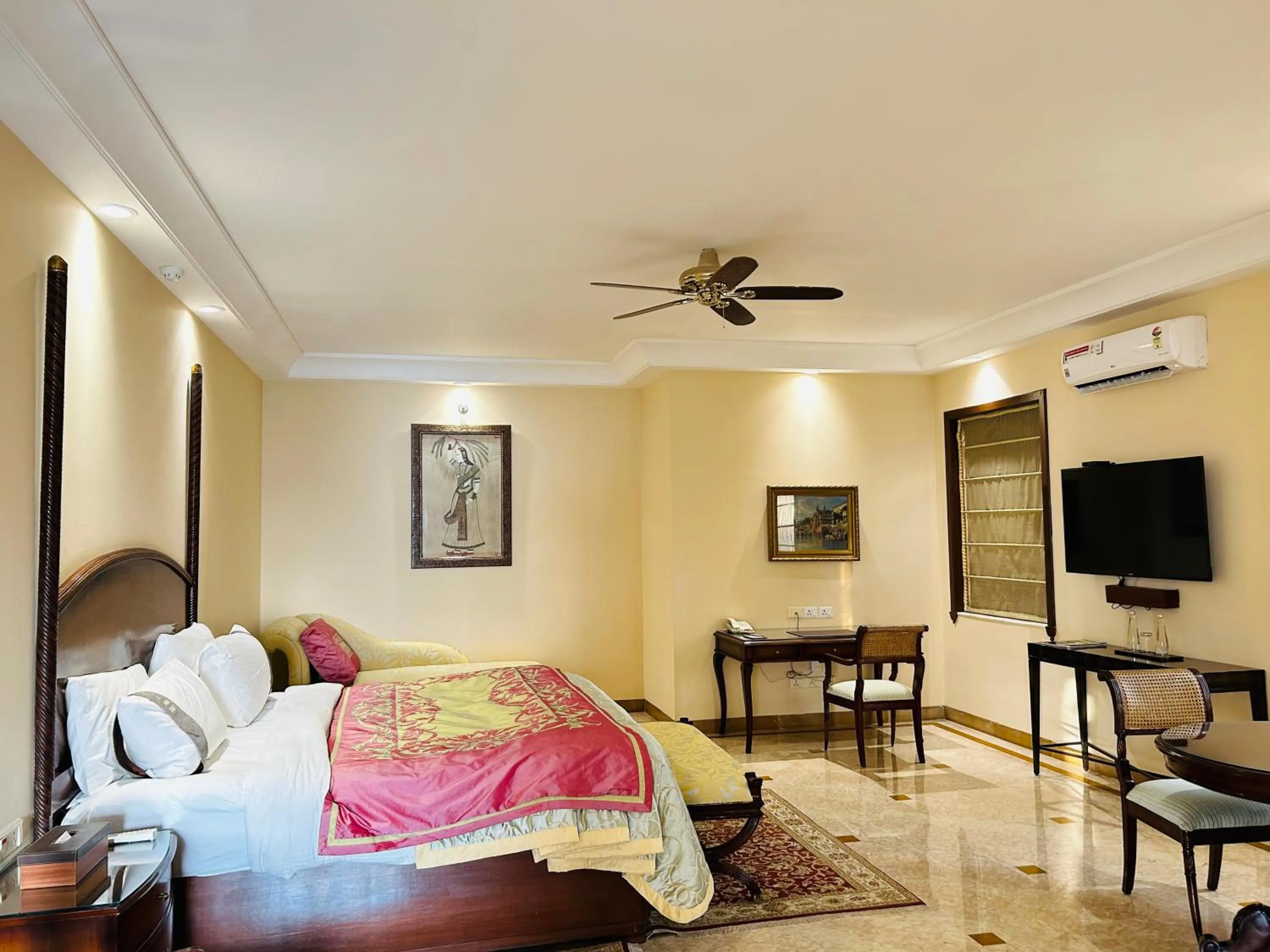 Bed in The Lalit Laxmi Vilas Palace