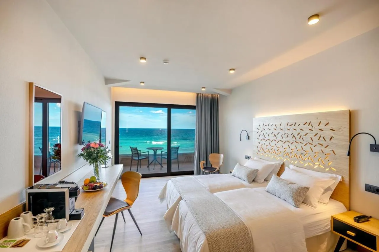 Bed in Atlantis Beach Hotel