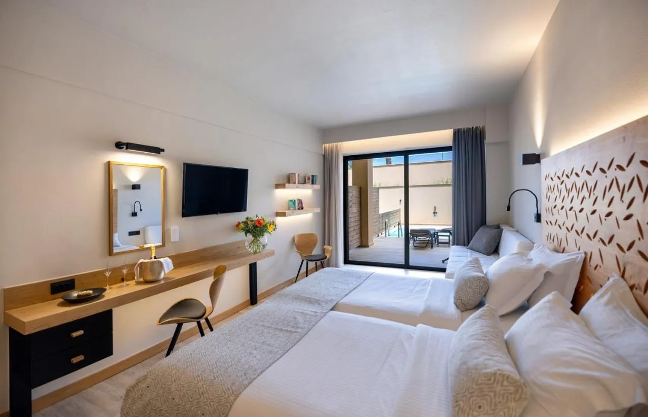 Bed in Atlantis Beach Hotel