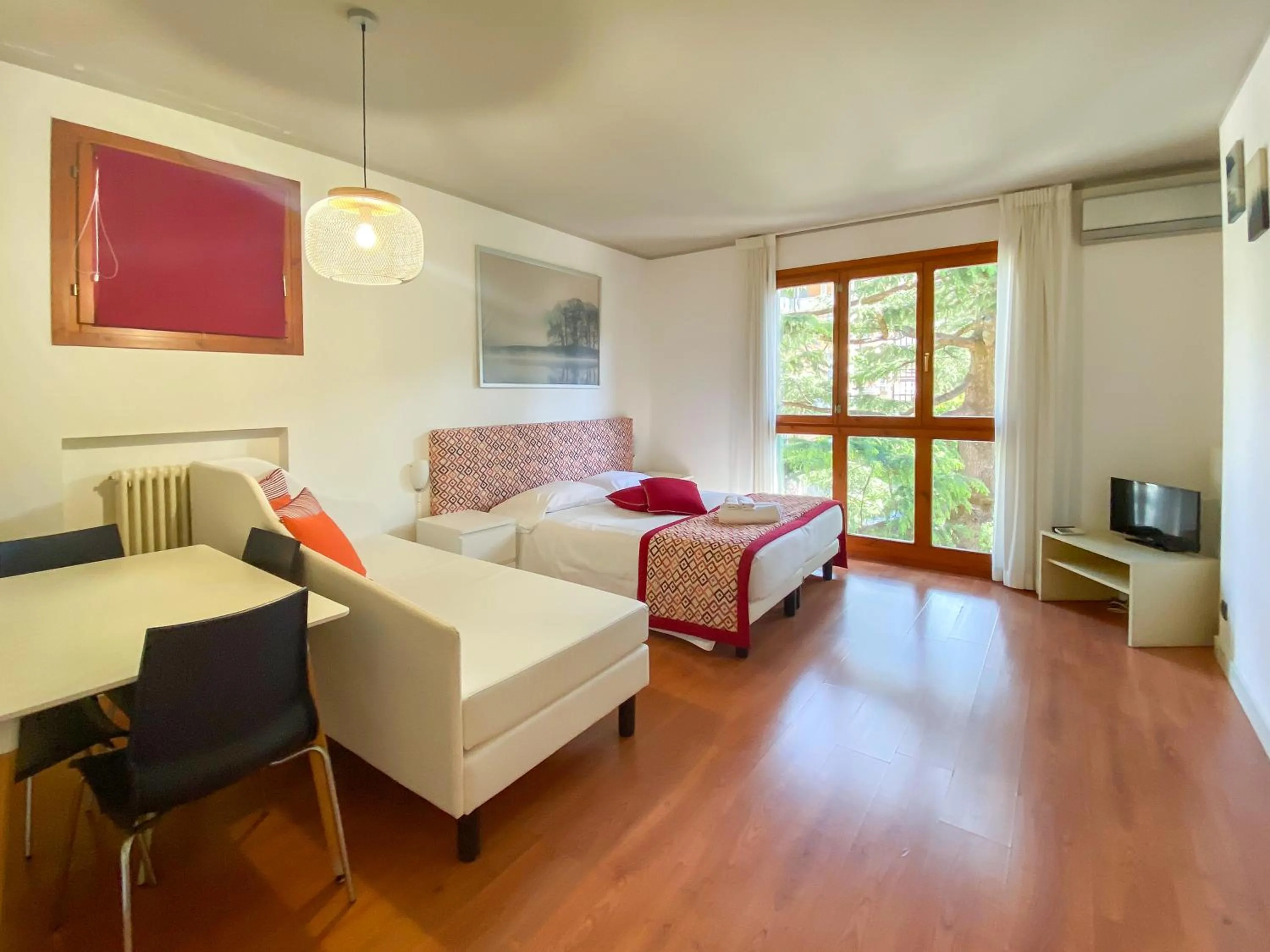 Living room, Bed in Cernobbio Residence