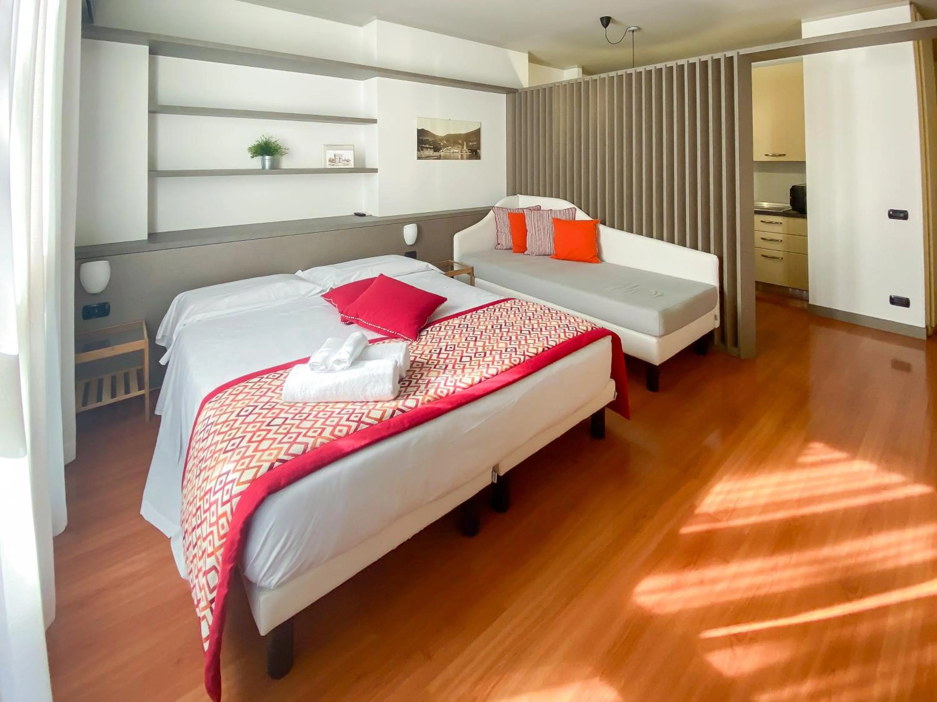 Living room, Bed in Cernobbio Residence