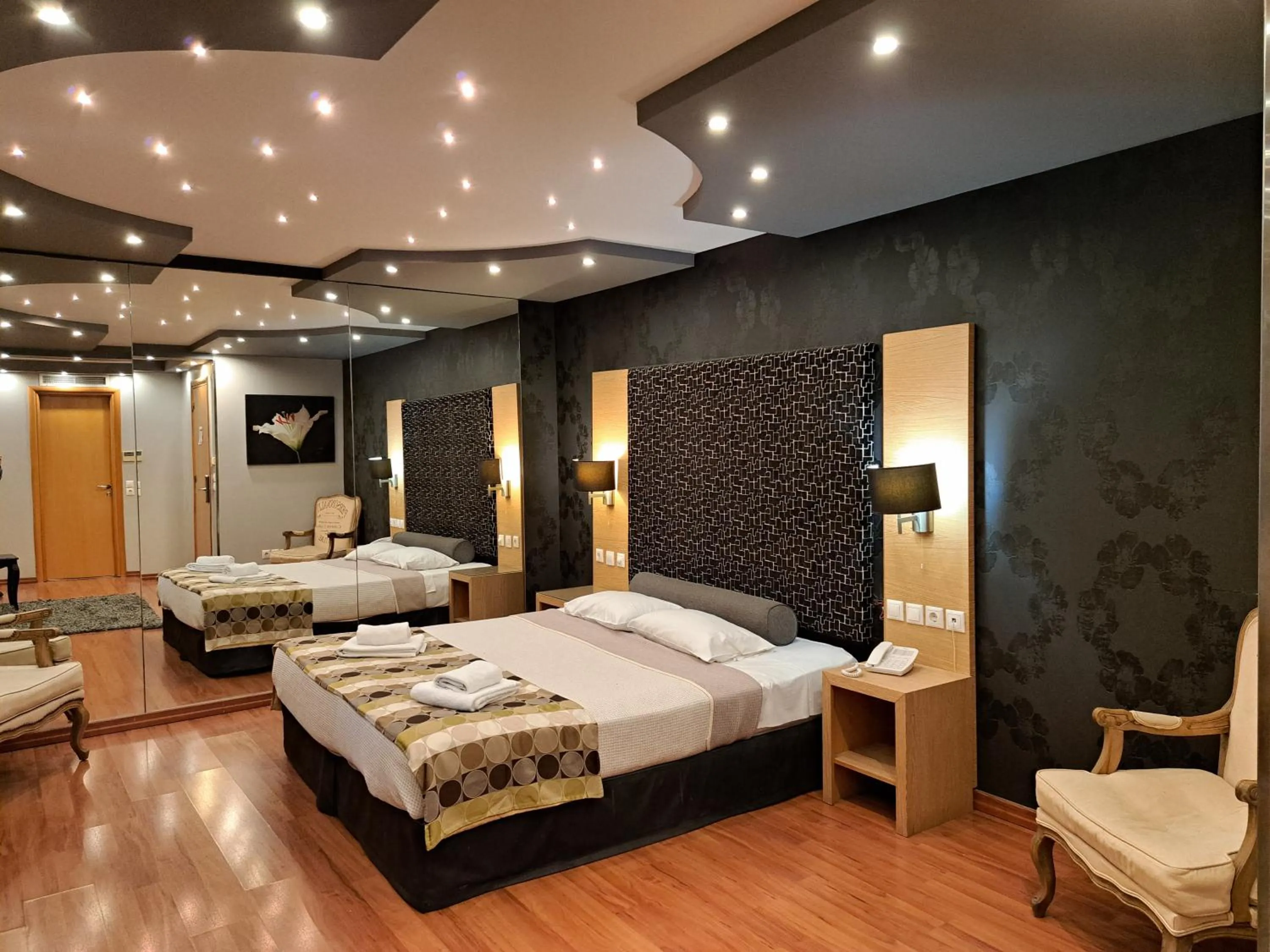 Bed in Nefeli Hotel Alimos