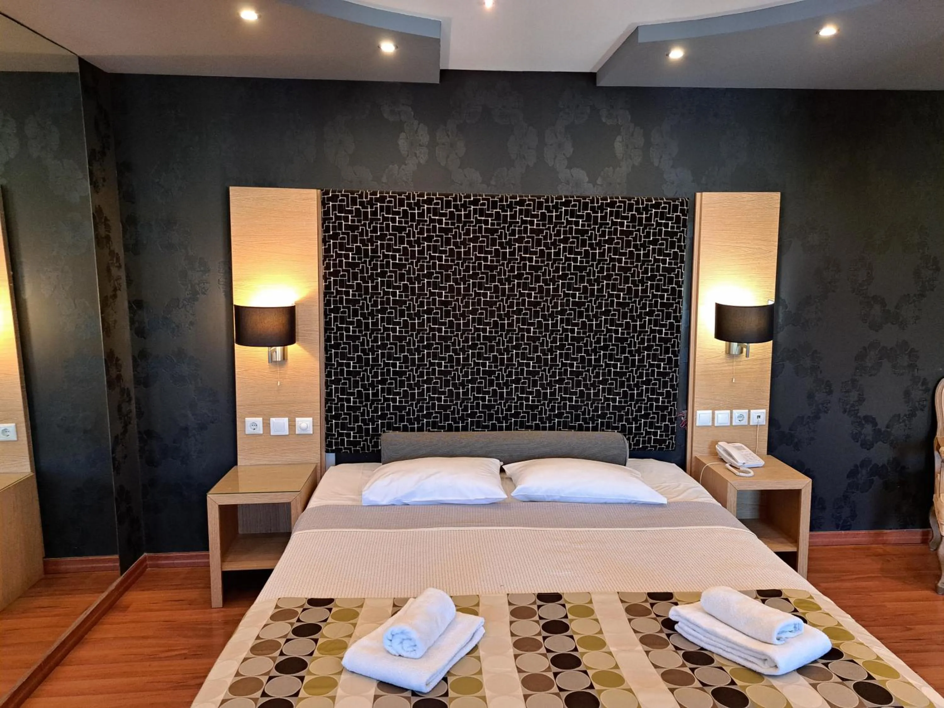 Bed in Nefeli Hotel Alimos