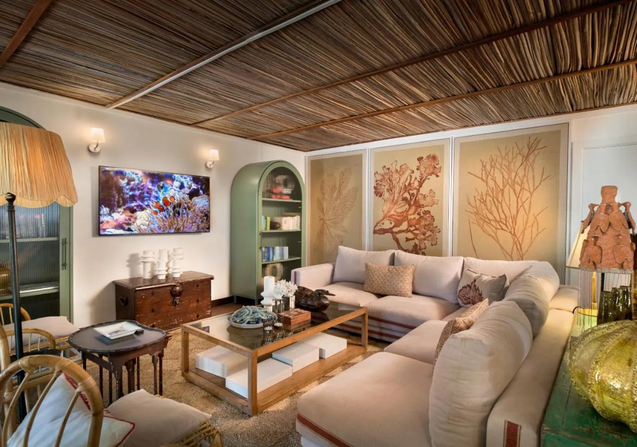 Seating area in La Maison d'Eté Hotel by NEWMARK