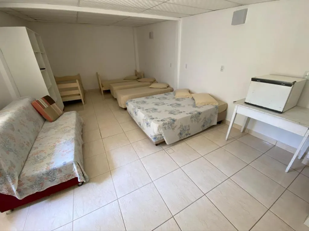Photo of the whole room, Bed in Pousada Morada das Nações