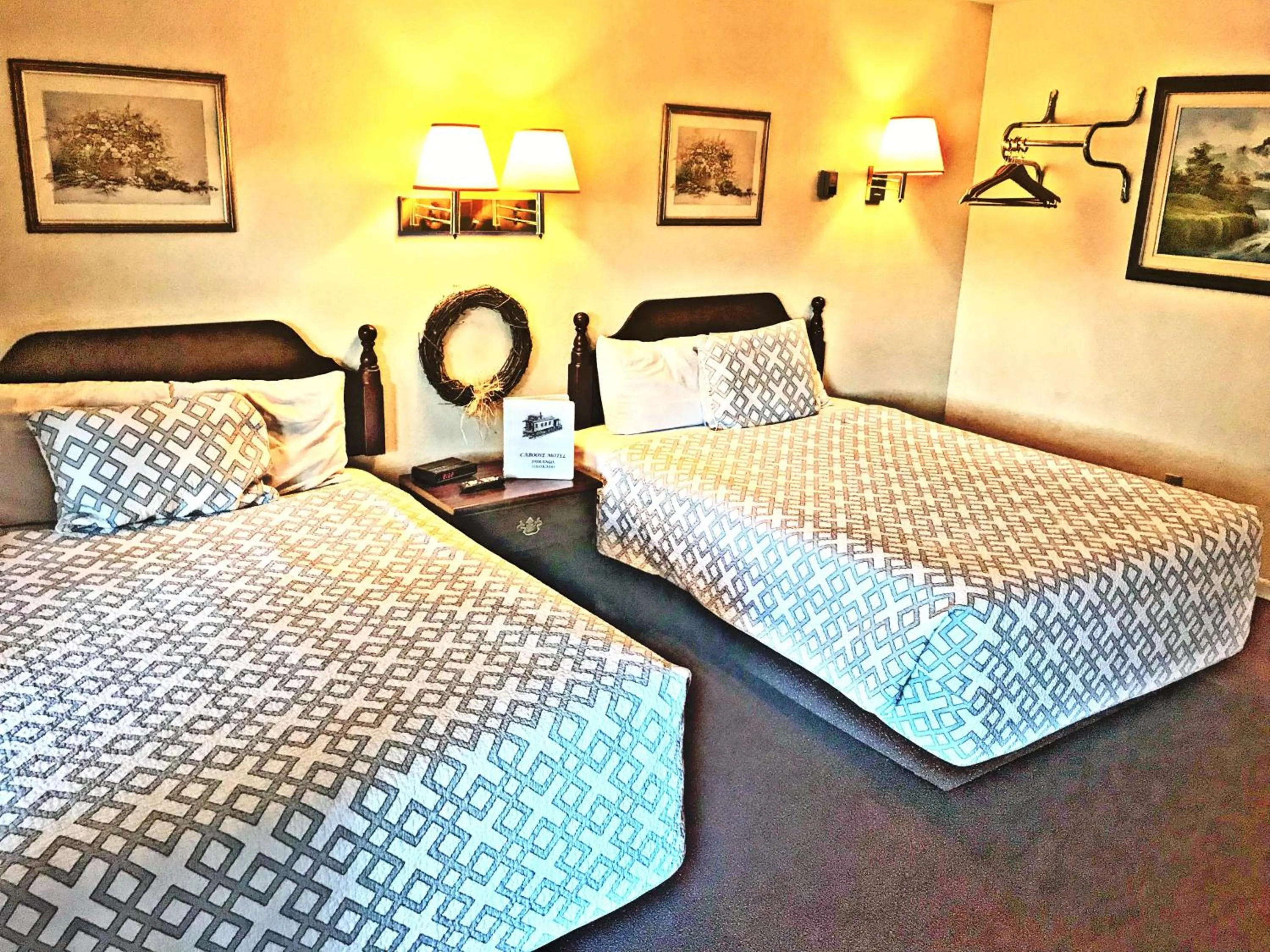 Bed in Caboose Motel & Gift Shop