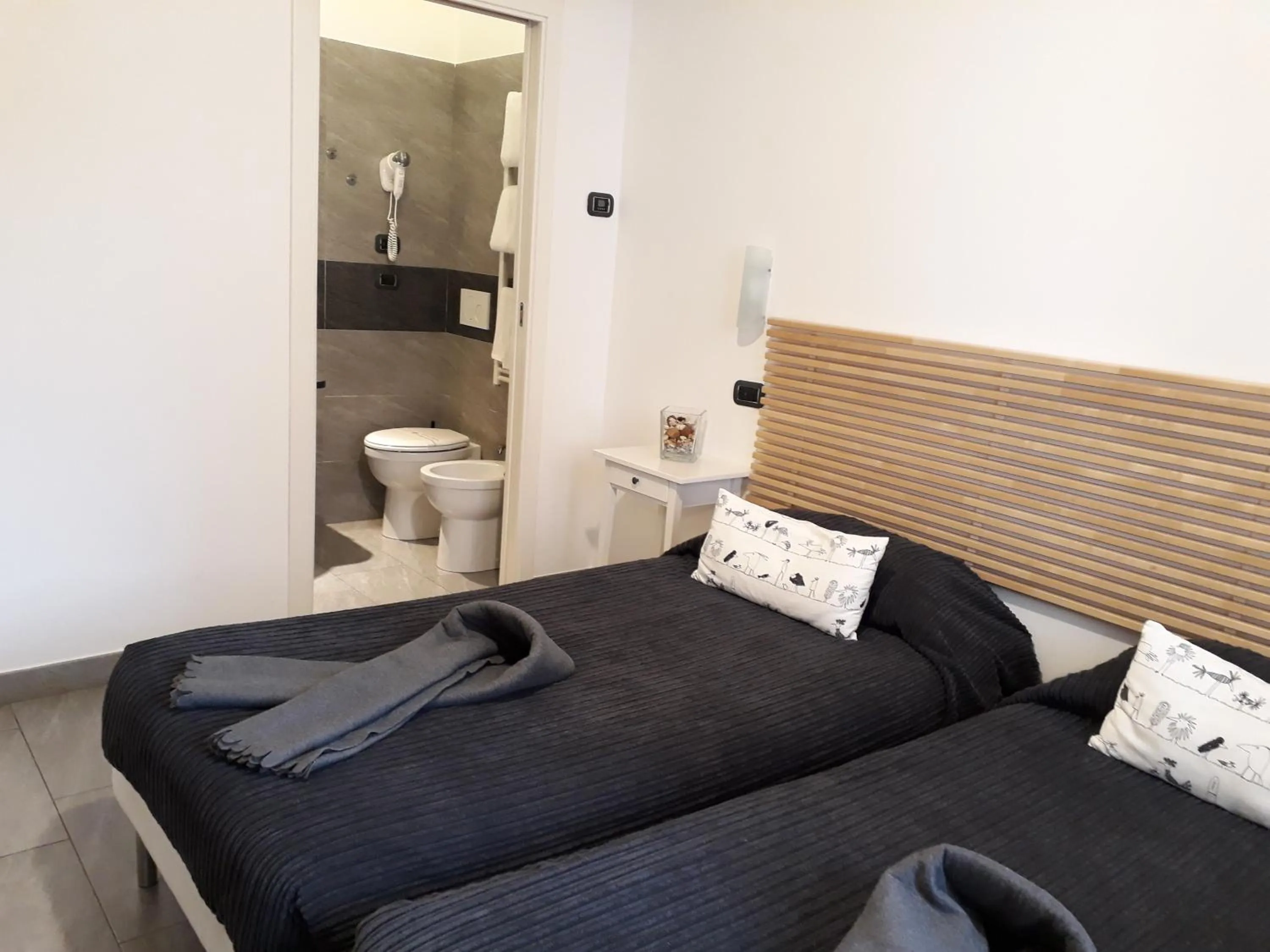 Bedroom in Affittacamere Delfo