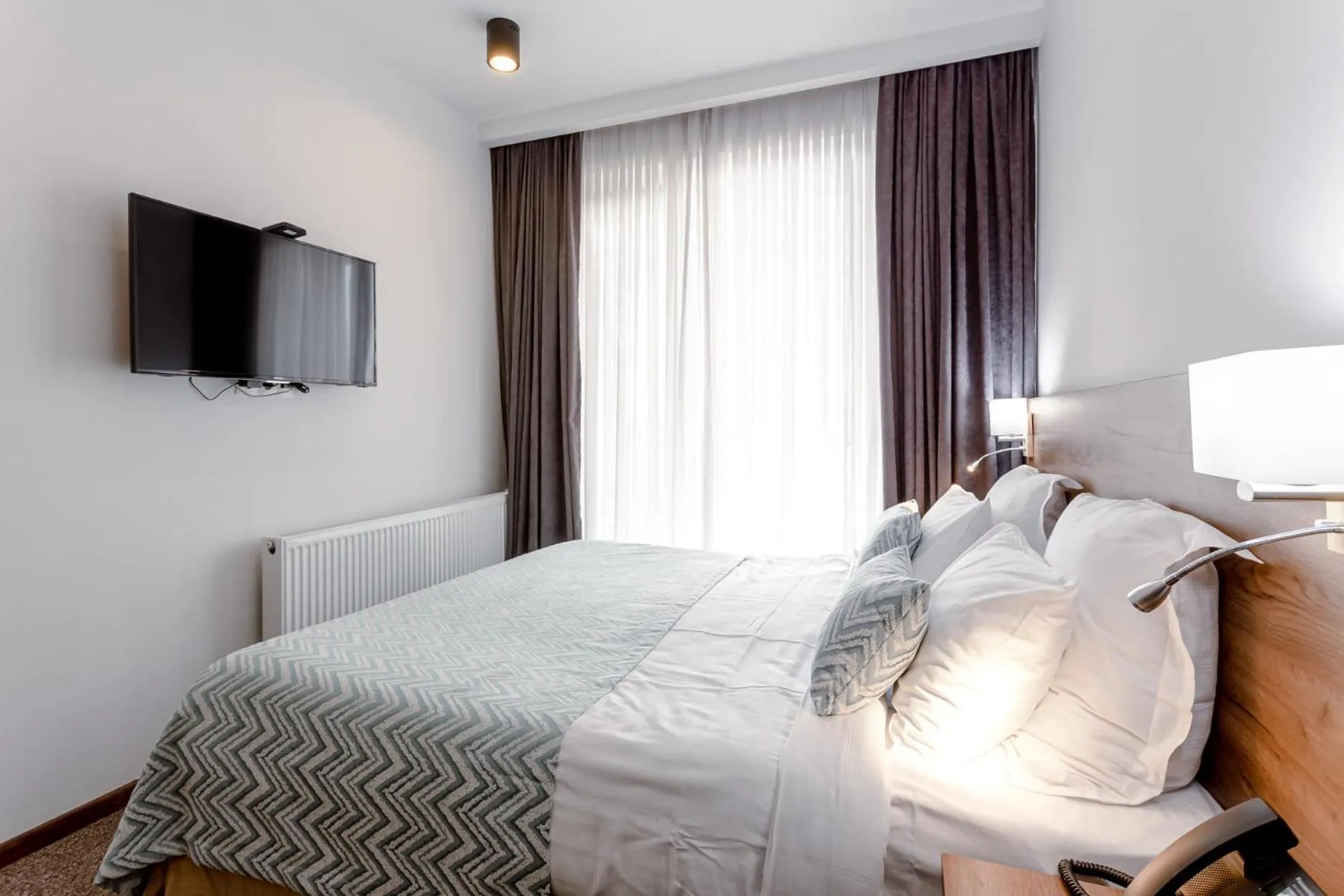 Bed in AuRoom Bakuriani Resort