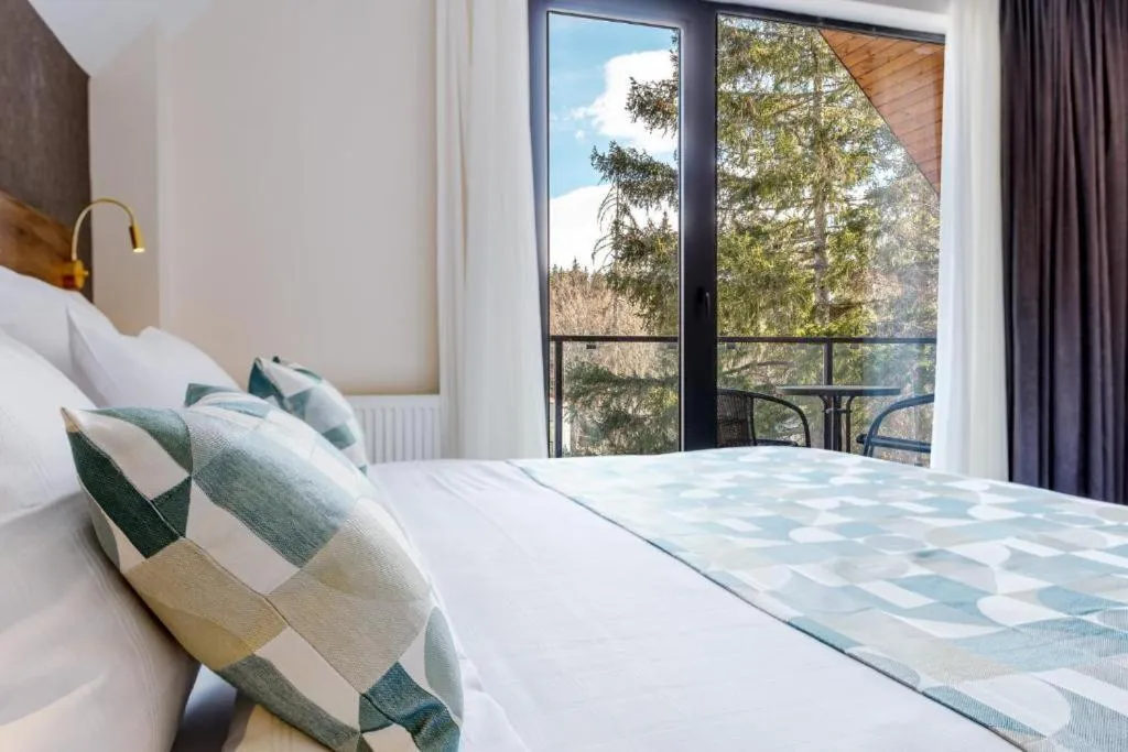 Balcony/Terrace, Bed in AuRoom Bakuriani Resort