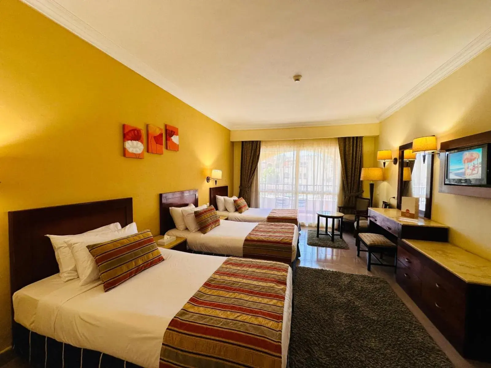 Deluxe Triple Room with Pool View in Regency Plaza Aqua Park and Spa Resort Deluxe Triple Room with Pool View in Regency Plaza Aqua Park and Spa Resort