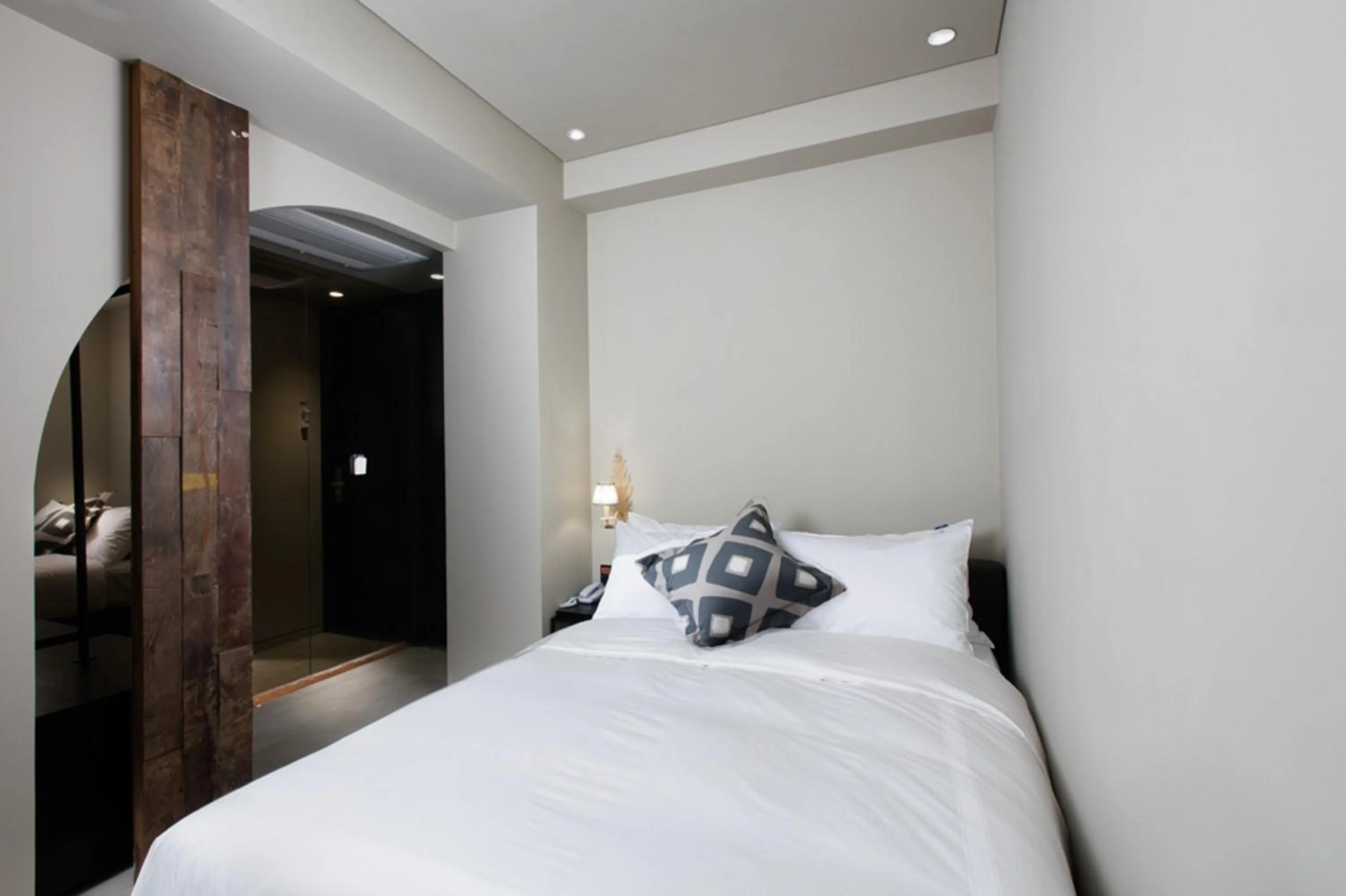 Bed in BROWN DOT Hotel Dadaepo Beach ㅡ 구 Oia Hotel