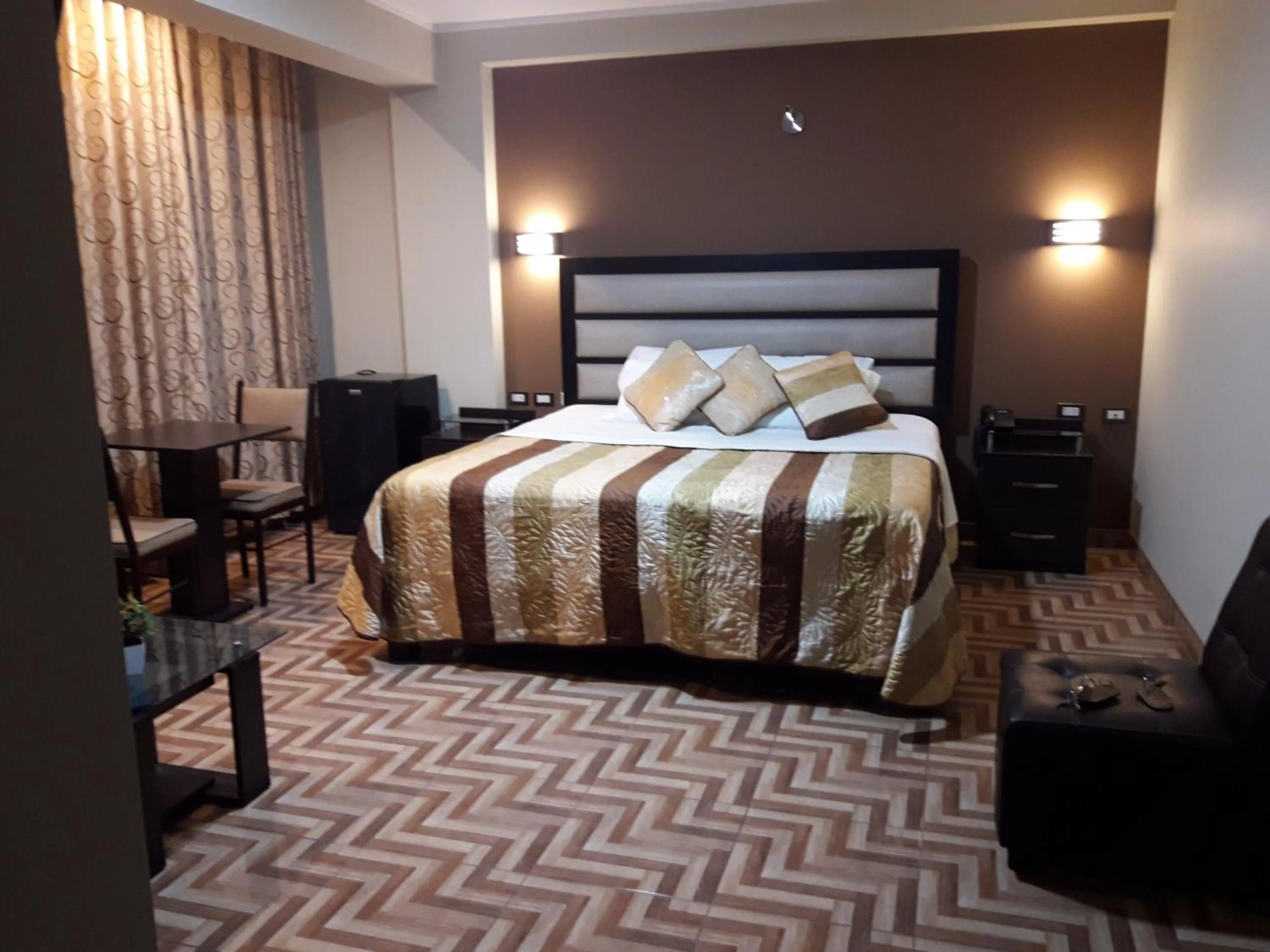 Bed in Gavina Inn Hotel